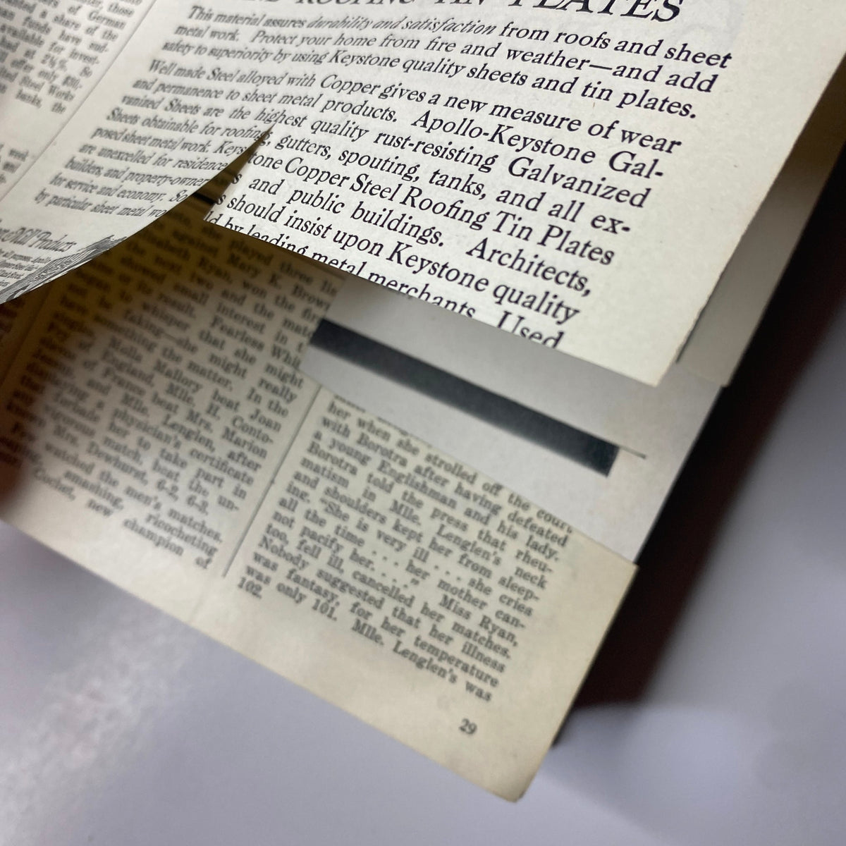 Close-up of a page from the Time Magazine bound volume, featuring printed text related to advertisements, relevant to 'Time Magazine Bound Weekly 1926 July - December'.