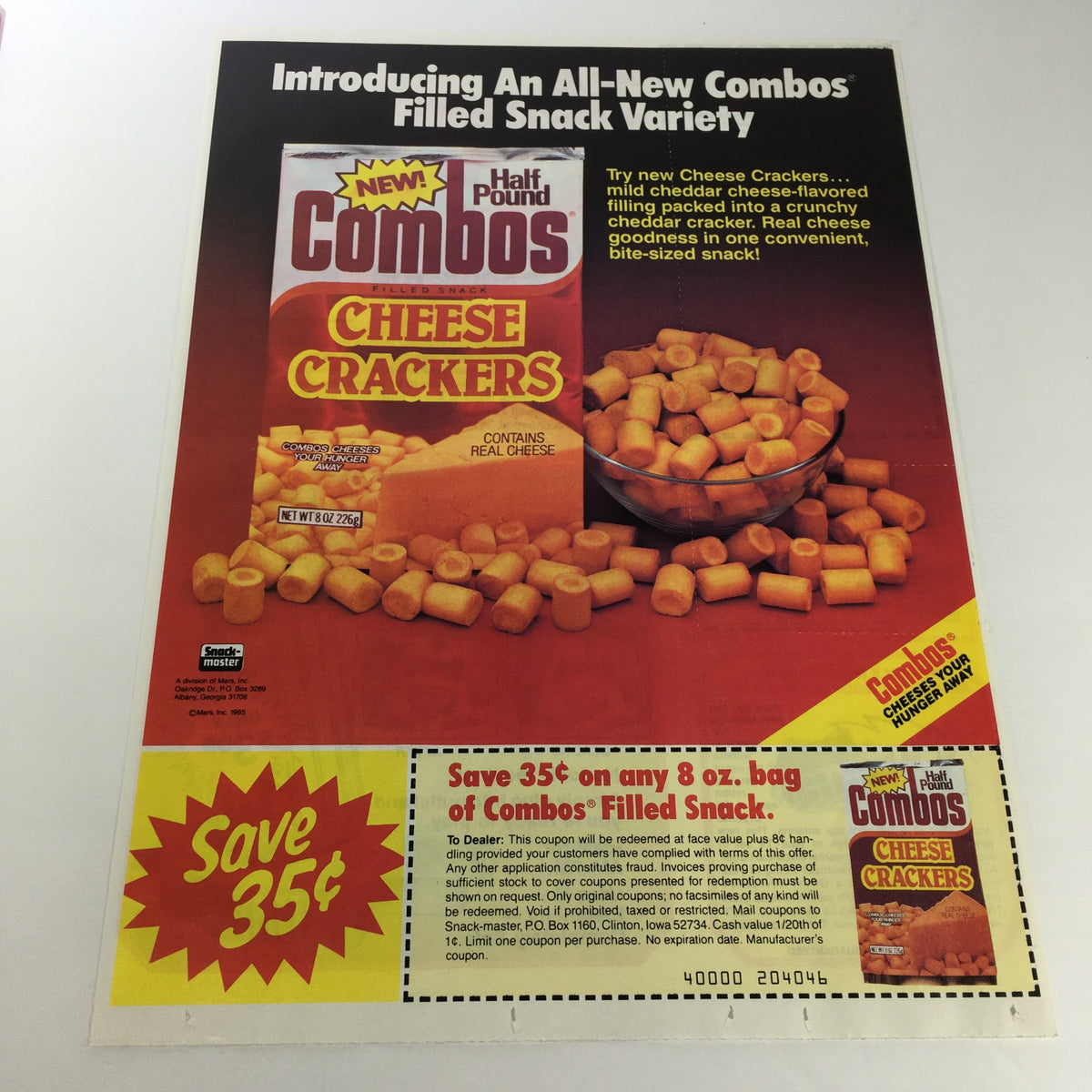 VTG Retro 1983 Combos Filled Snack Half Pound Cheese Crackers Print Ad showcasing a vibrant advertisement featuring cheese crackers, with promotional text and imagery of the product.