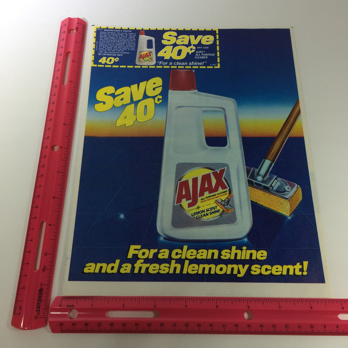 VTG Retro 1984 Ajax All Purpose Cleaner & Nescafe Coffee Print Ad Coupon displaying a ruler next to an Ajax cleaner advertisement, emphasizing the 40 cent savings deal. An excellent collectible from the 1980s.