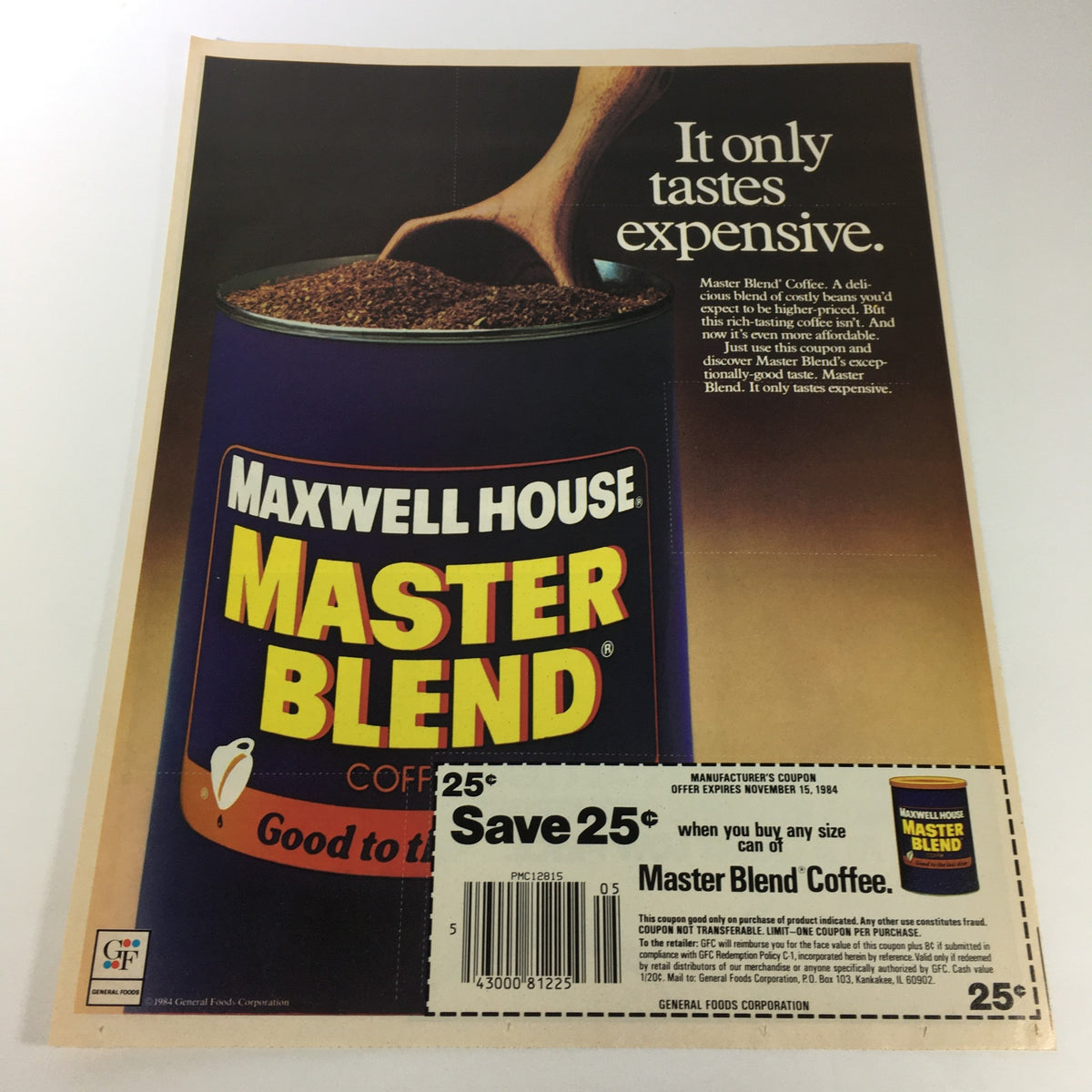 VTG Retro 1984 Maxwell House Master Blend Coffee Print Ad showcasing a large can of Maxwell House Master Blend Coffee, highlighting the phrase 'It only tastes expensive' with an image of coffee being poured.