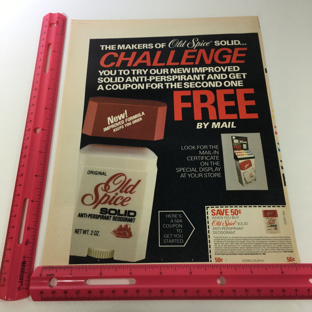 VTG Retro 1985 Old Spice Solid Original AntiPerspirant Deodorant Print Ad Coupon showcasing a promotional offer for Old Spice solid anti-perspirant with a coupon to get a second one free by mail. Features bold text and product imagery.
