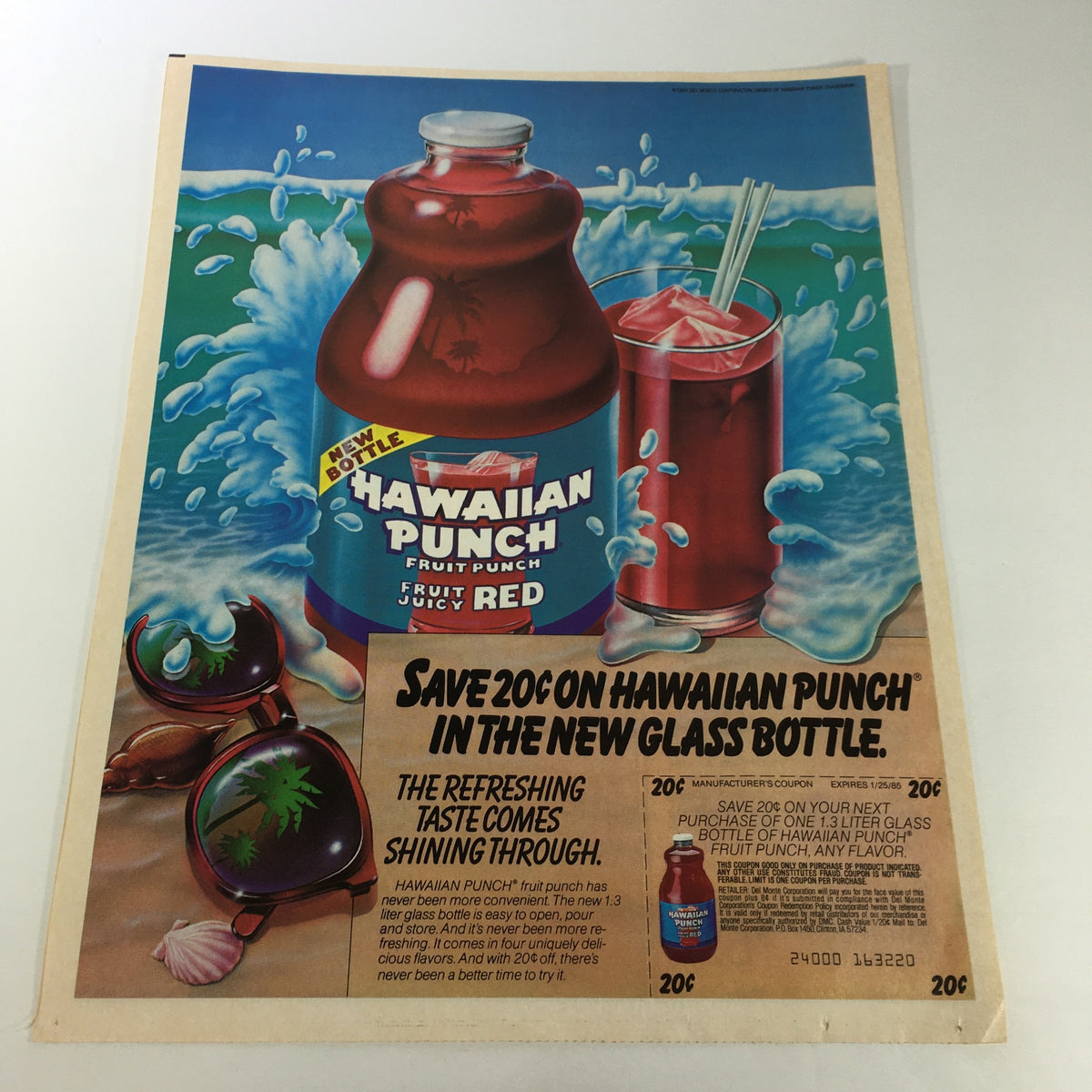 VTG Retro 1985 Hawaiian Punch Fruit Punch Fruit Juice Print Ad featuring a bottle and a glass with fruity colored drink, promoting savings on Hawaiian Punch in a vibrant tropical setting.