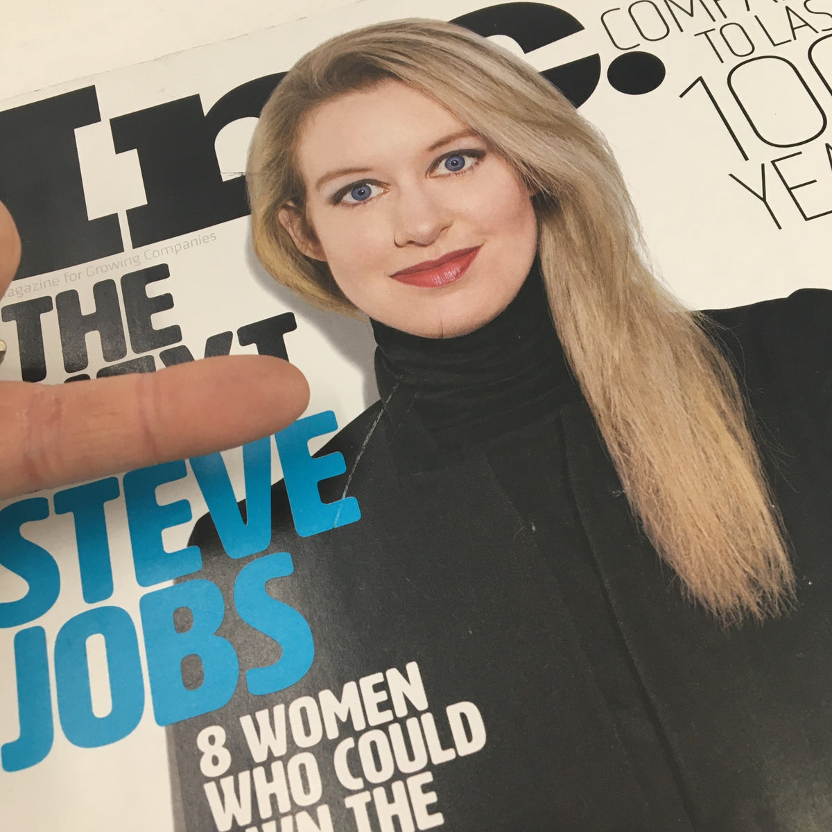 Cover of Inc. Magazine October 2015 featuring Elizabeth Holmes, titled 'Elizabeth Holmes is The Next Steve Jobs', showcasing her portrait and the headline in blue text.