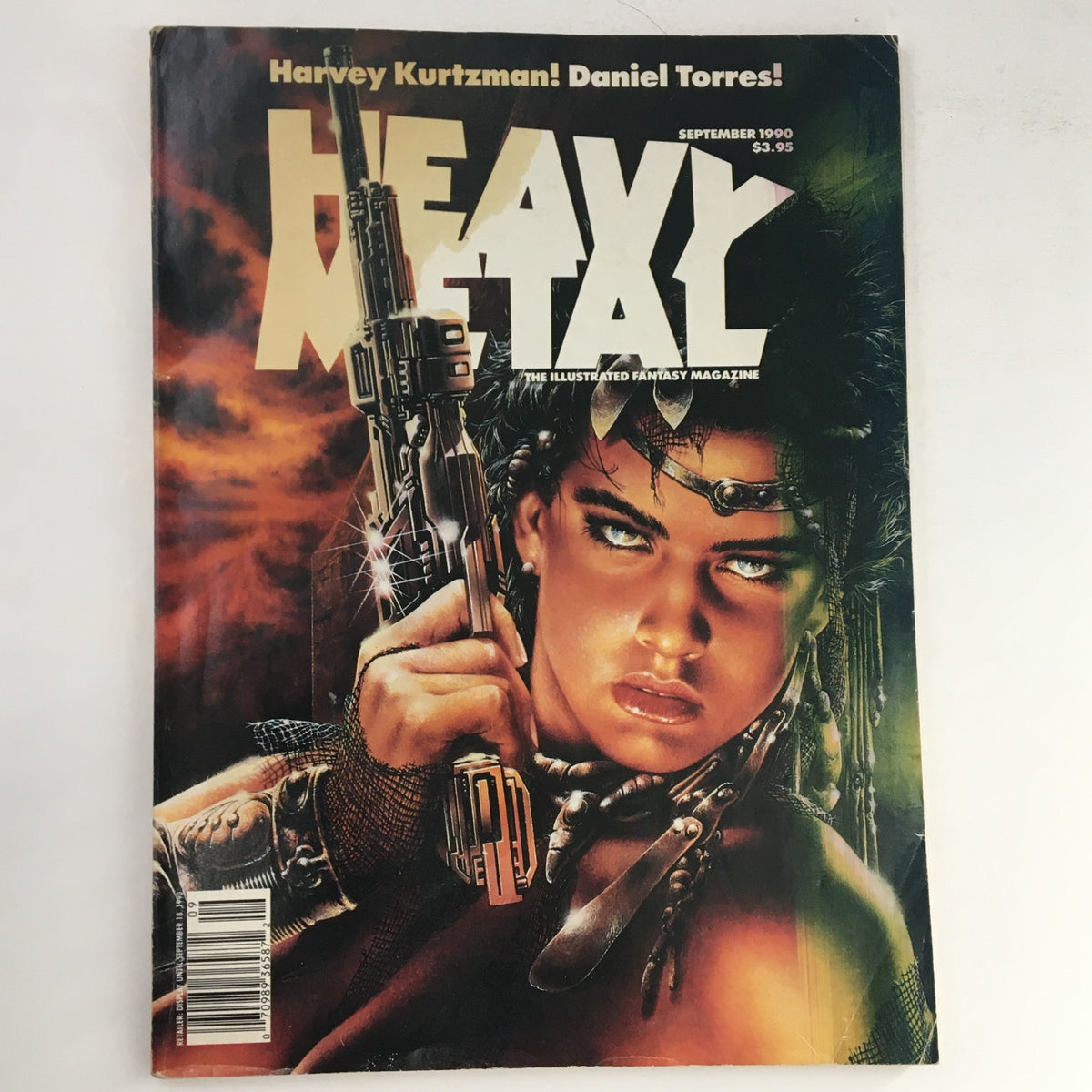 Cover of Heavy Metal Fantasy Magazine September 1990 featuring artwork by Harvey Kurtzman, showcasing a fierce character with a gun and dramatic background.