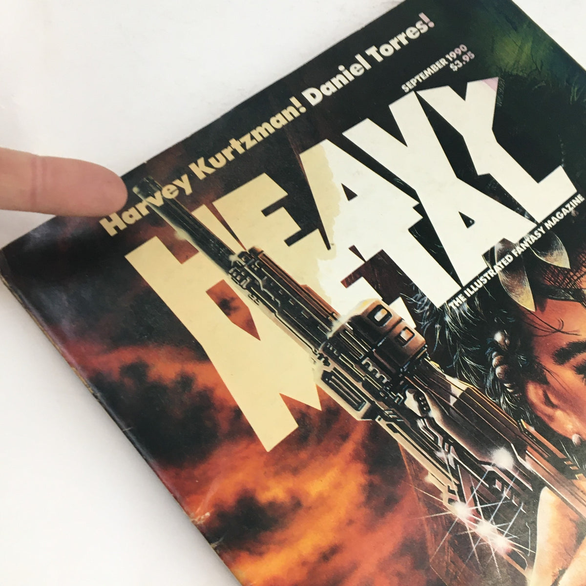 Another angle of the cover of Heavy Metal Fantasy Magazine September 1990 emphasizing the title and character art by Harvey Kurtzman.