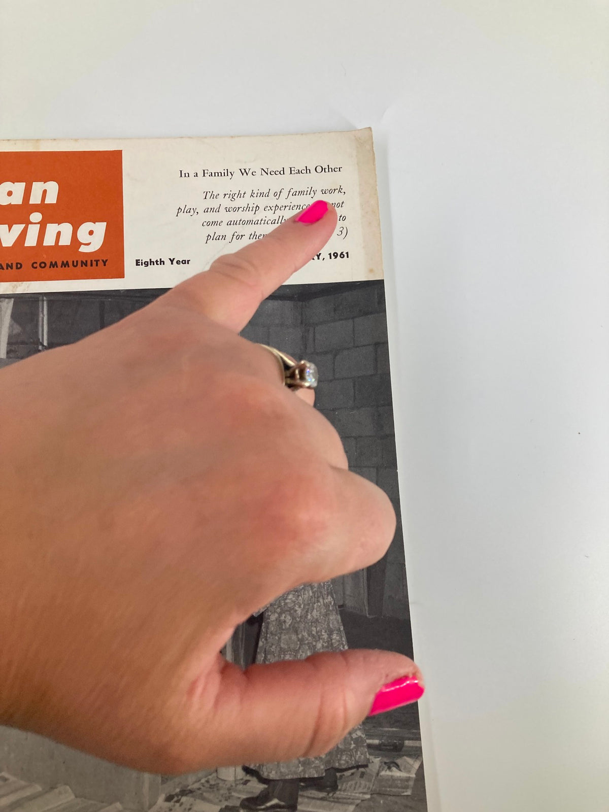 Cover of VTG Christian Living Magazine May 1961 featuring the title 'In A Family We Need Each Other,' with a hand pointing to the text.