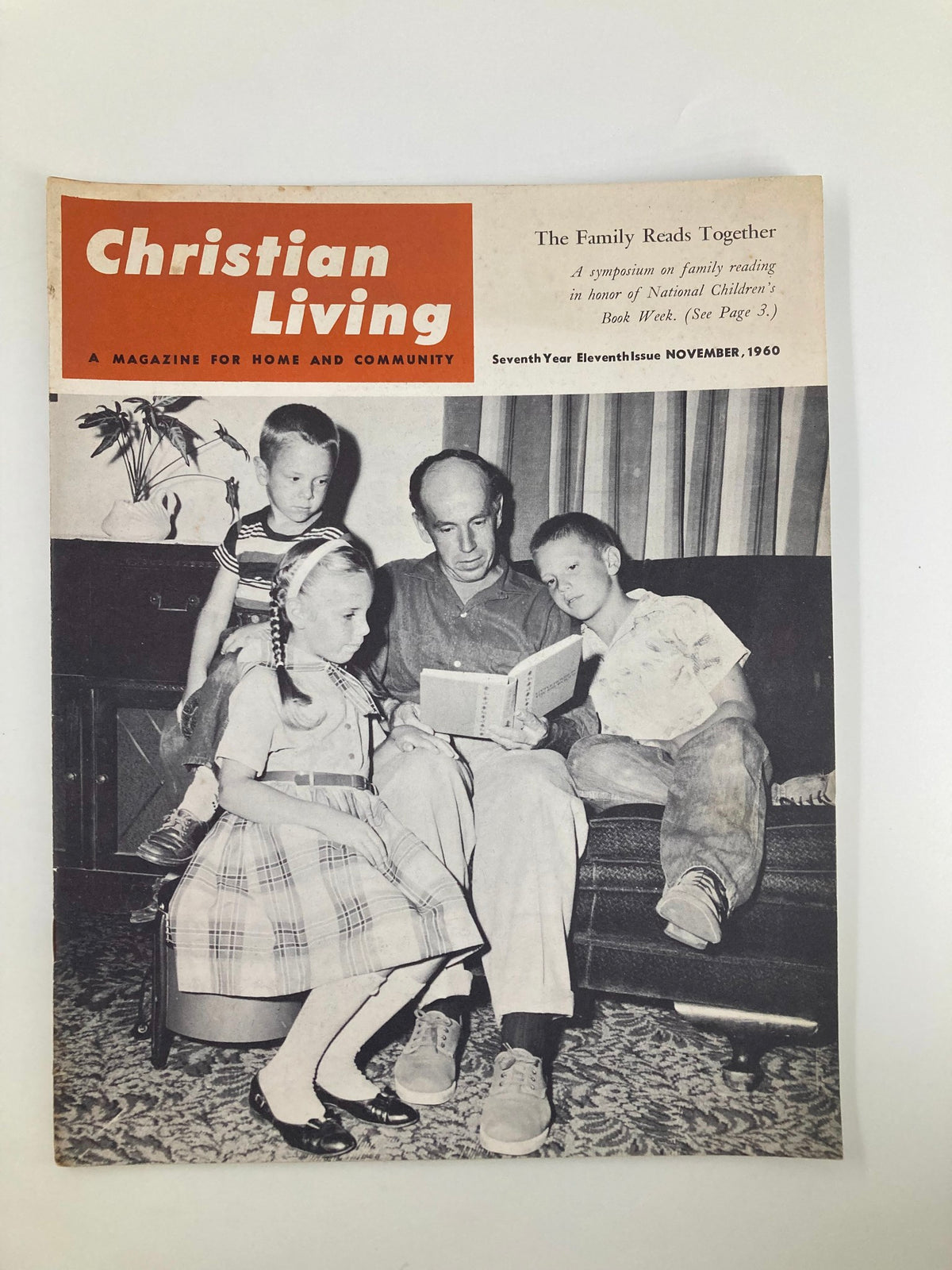Vintage Christian Living Magazine November 1960 cover featuring a family gathered around reading together, highlighting the symposium on family reading.