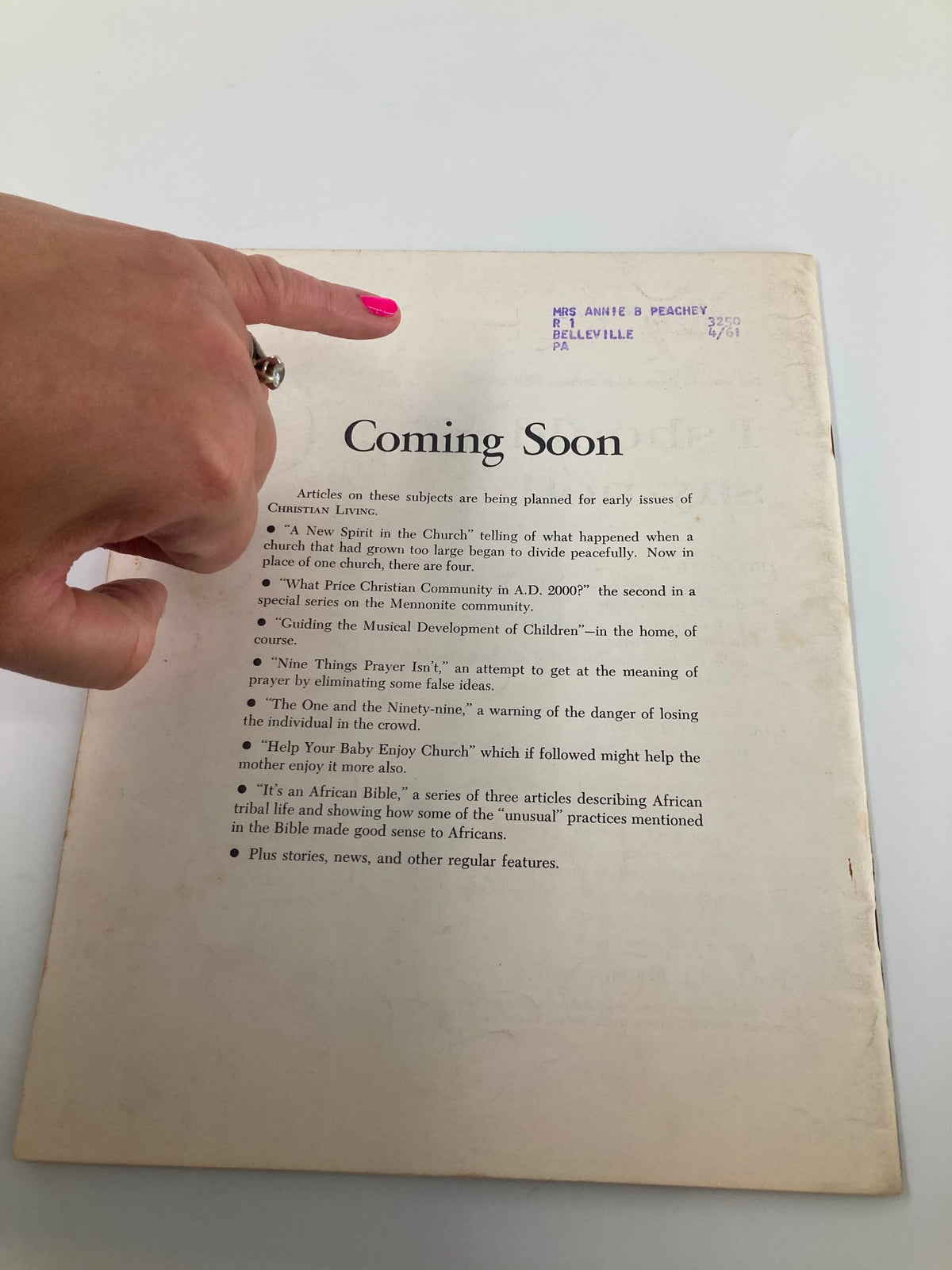 Back cover of VTG Christian Living Magazine January 1961 with a note of future articles and a mailing label.