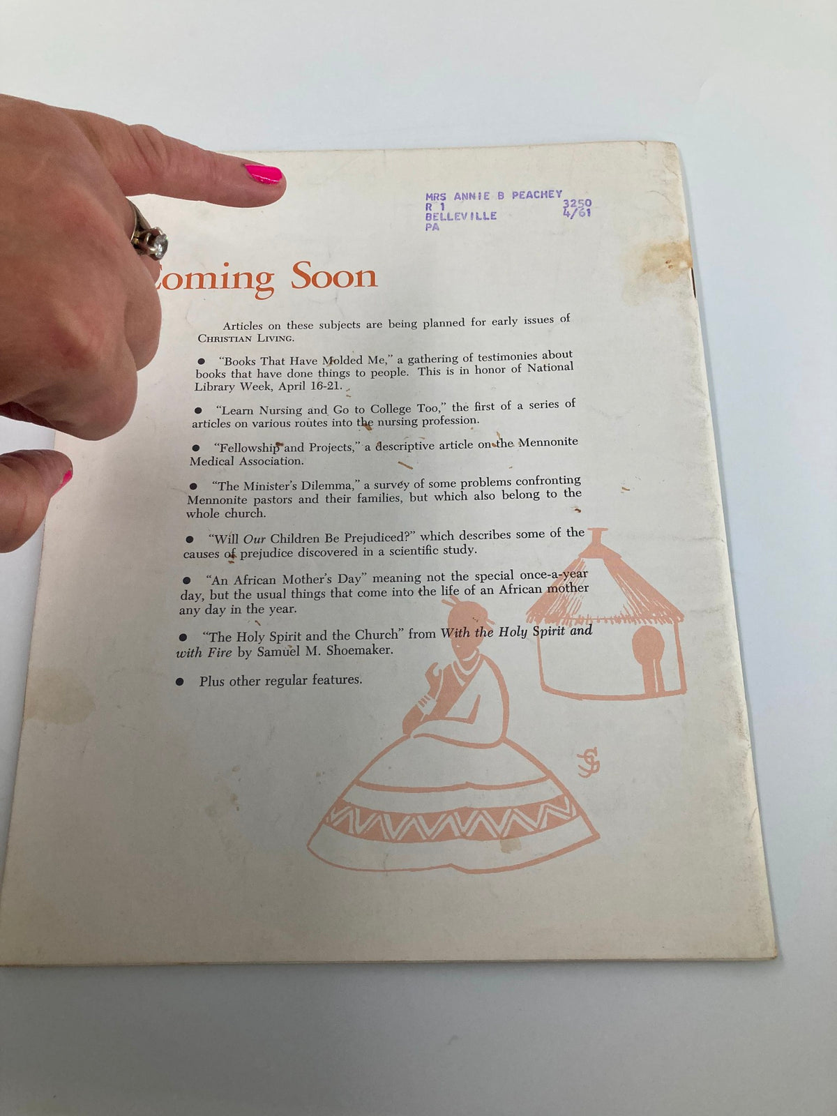 Back cover of the March 1961 issue of VTG Christian Living Magazine featuring upcoming article teasers, such as 'Books That Have Molded Me' and 'An African Mother's Day.' The design includes a hand-drawn illustration of a woman in traditional attire next to a hut, showcasing cultural elements relevant to the magazine's theme.