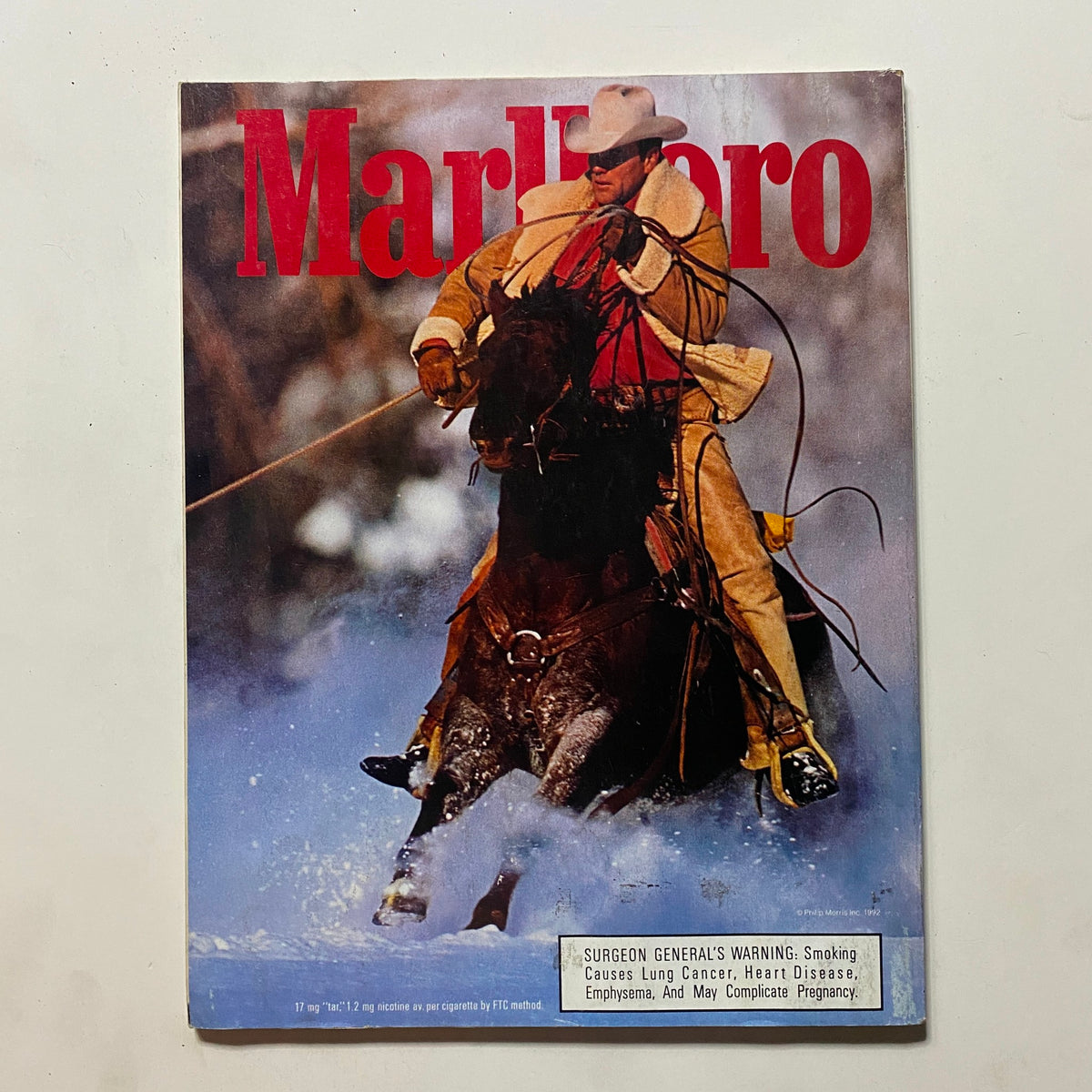 Vintage Marlboro magazine cover depicting a cowboy on horseback, not related to Omni Magazine March 1992 Vol 14 No. 6 but showing classic American imagery.