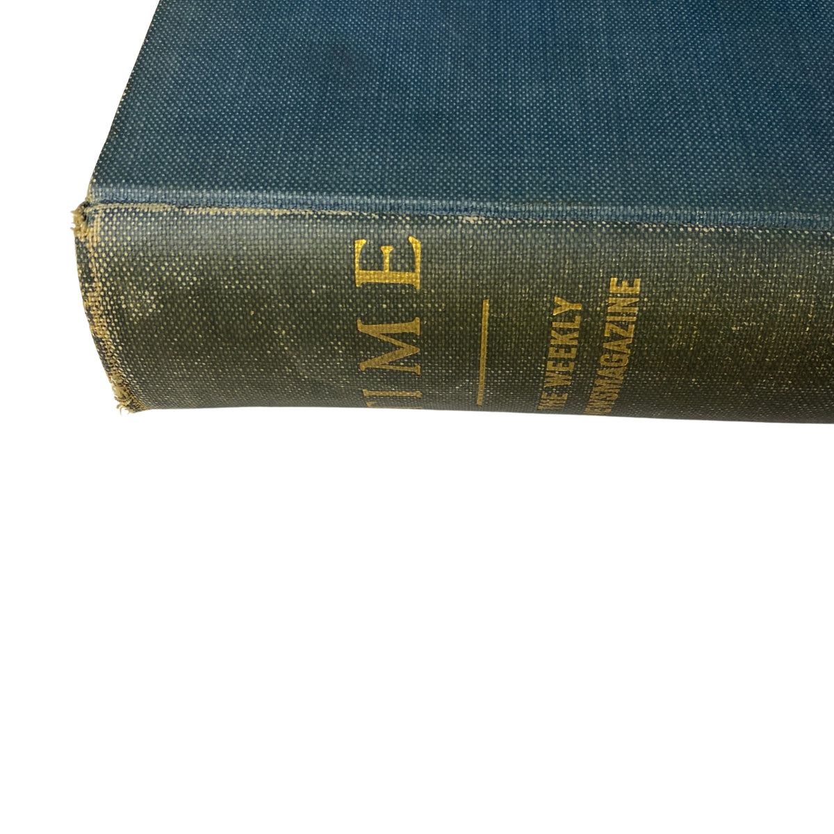 Close-up of the spine of the bound Time Magazine volume, titled with gold lettering and showing wear, from April 6 to June 29, 1931.
