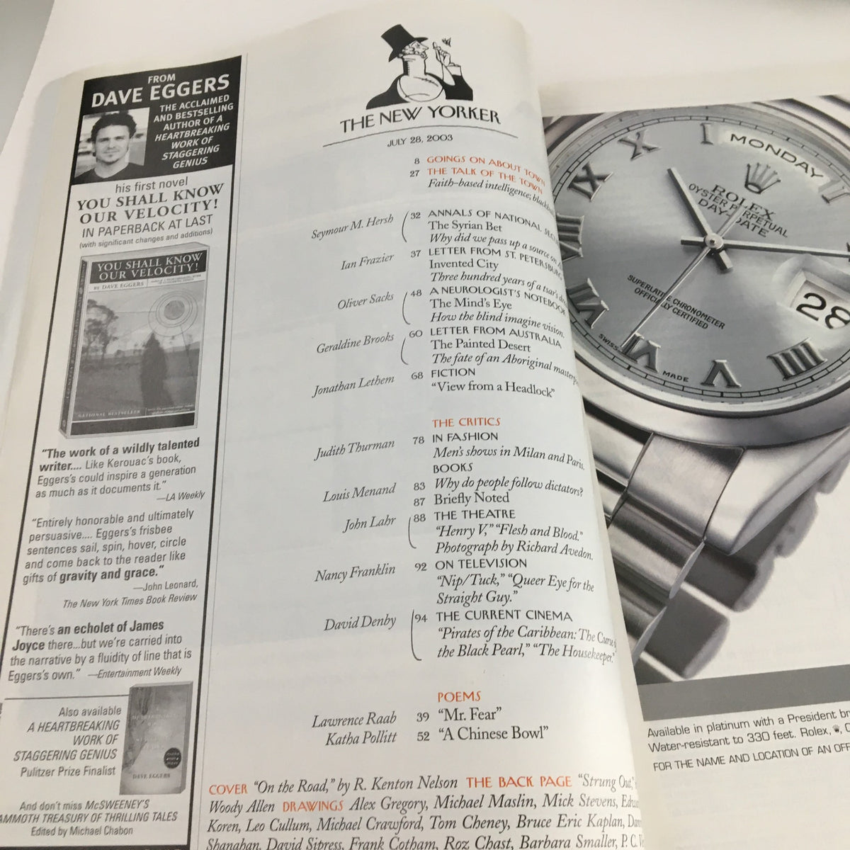 Inside page of The New Yorker July 28 2003 showcasing an advertisement and a Rolex watch, illustrating the magazine's sophisticated content and design.