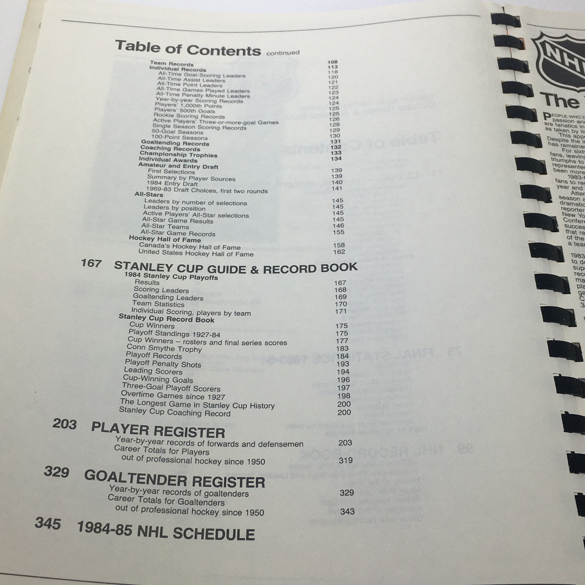 Table of contents page from the VTG NHL Official Guide & Record Book 1984-1985, featuring sections for Stanley Cup Guide, Player Register, and NHL Schedule.