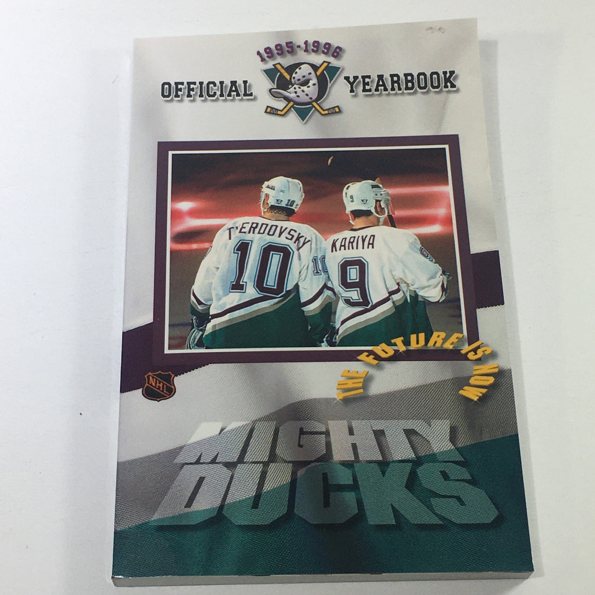VTG NHL Official Yearbook 1995-1996 featuring Mighty Ducks of Anaheim, showcasing players Tverdovsky and Kariya on the cover with the tagline 'The Future is Now'.