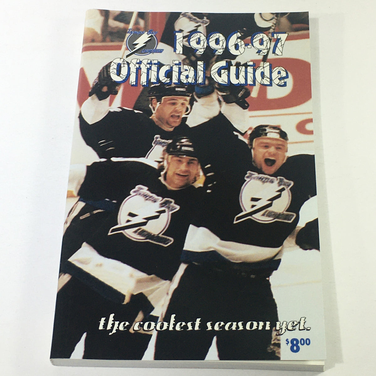 Cover of VTG NHL Official Guide 1996-1997 - Tampa Bay Lightning featuring players celebrating, noted as the coolest season yet.