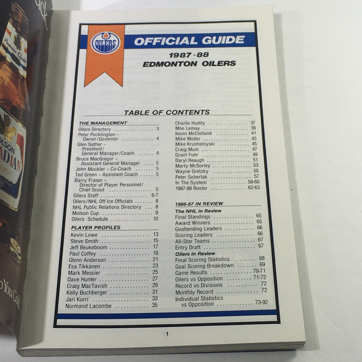 Inside page of the VTG NHL Official Guide 1987-1988 - Edmonton Oilers showing the table of contents with player profiles and management details.