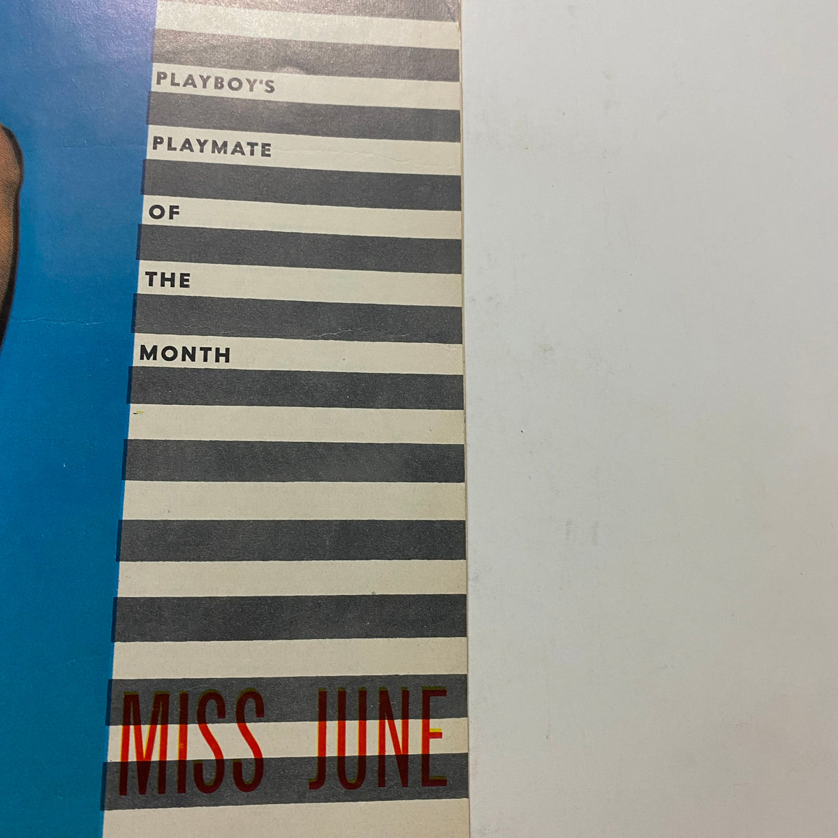 Side view of the VTG Playboy Magazine June 1954 displaying the text 'Playboy's Playmate of the Month Miss June', emphasizing the magazine's iconic features.