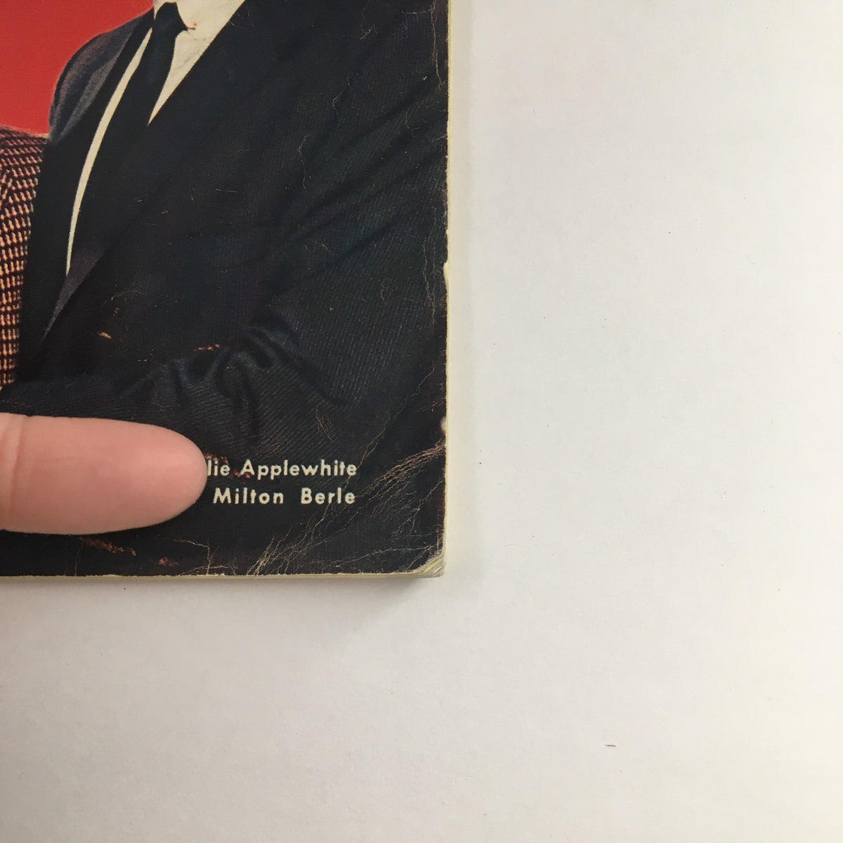 Close-up of the TV Guide Magazine cover from April 9, 1954, showcasing the names Charlie Applewhite and Milton Berle, an important piece of entertainment history.