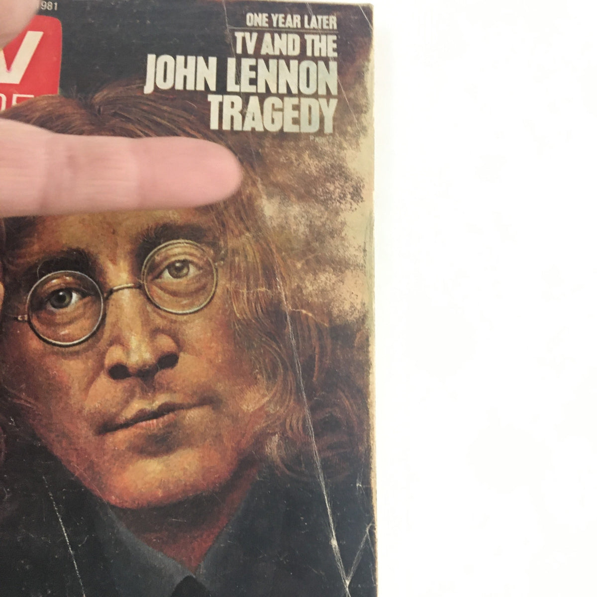 Close-up of the cover of TV Guide Magazine dated November 21, 1981, with John Lennon's portrait and the text 'One Year Later TV and the John Lennon Tragedy'.