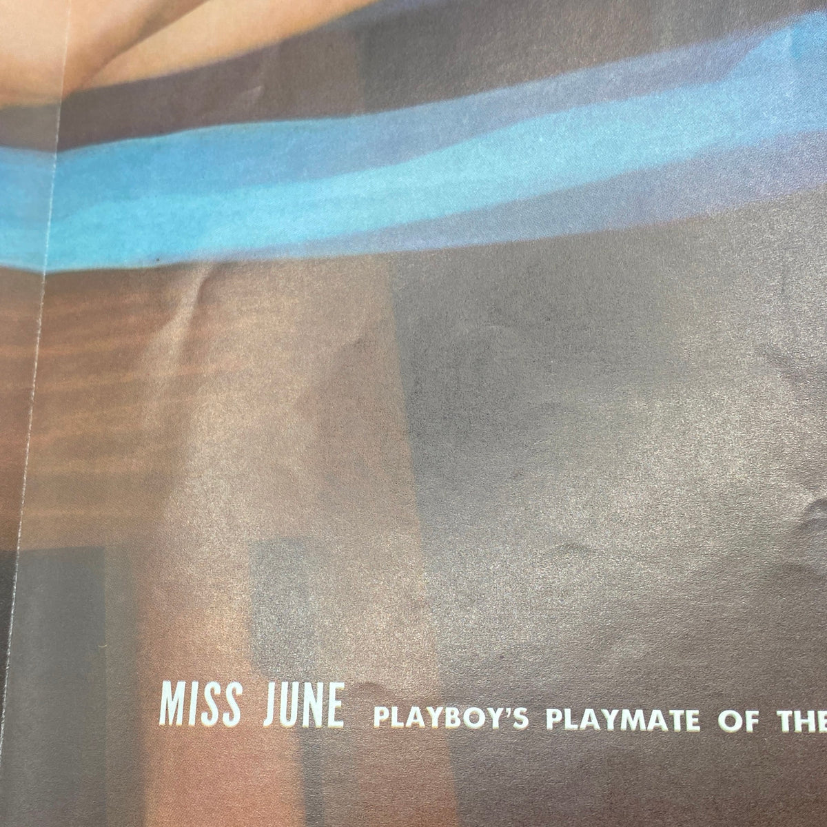 Inside the Vintage Playboy Magazine June 1958, highlighting the Playmate feature with the text 'Miss June Playboy's Playmate of the Month,' representing the allure of vintage media.