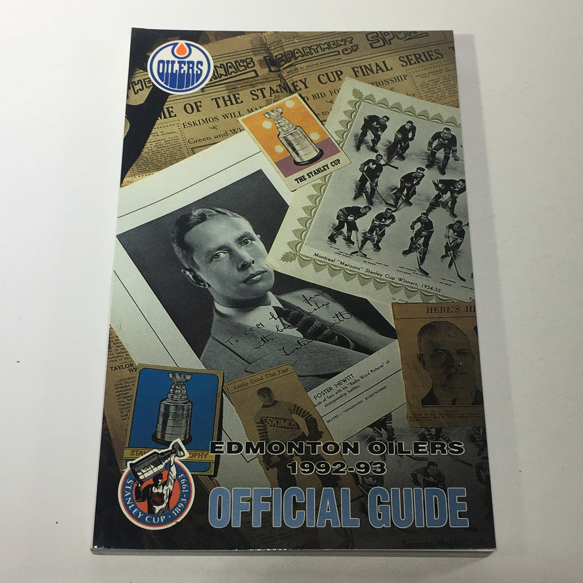 Official guide for the Edmonton Oilers from 1992-93, showcasing historical highlights, team photographs, and statistics.