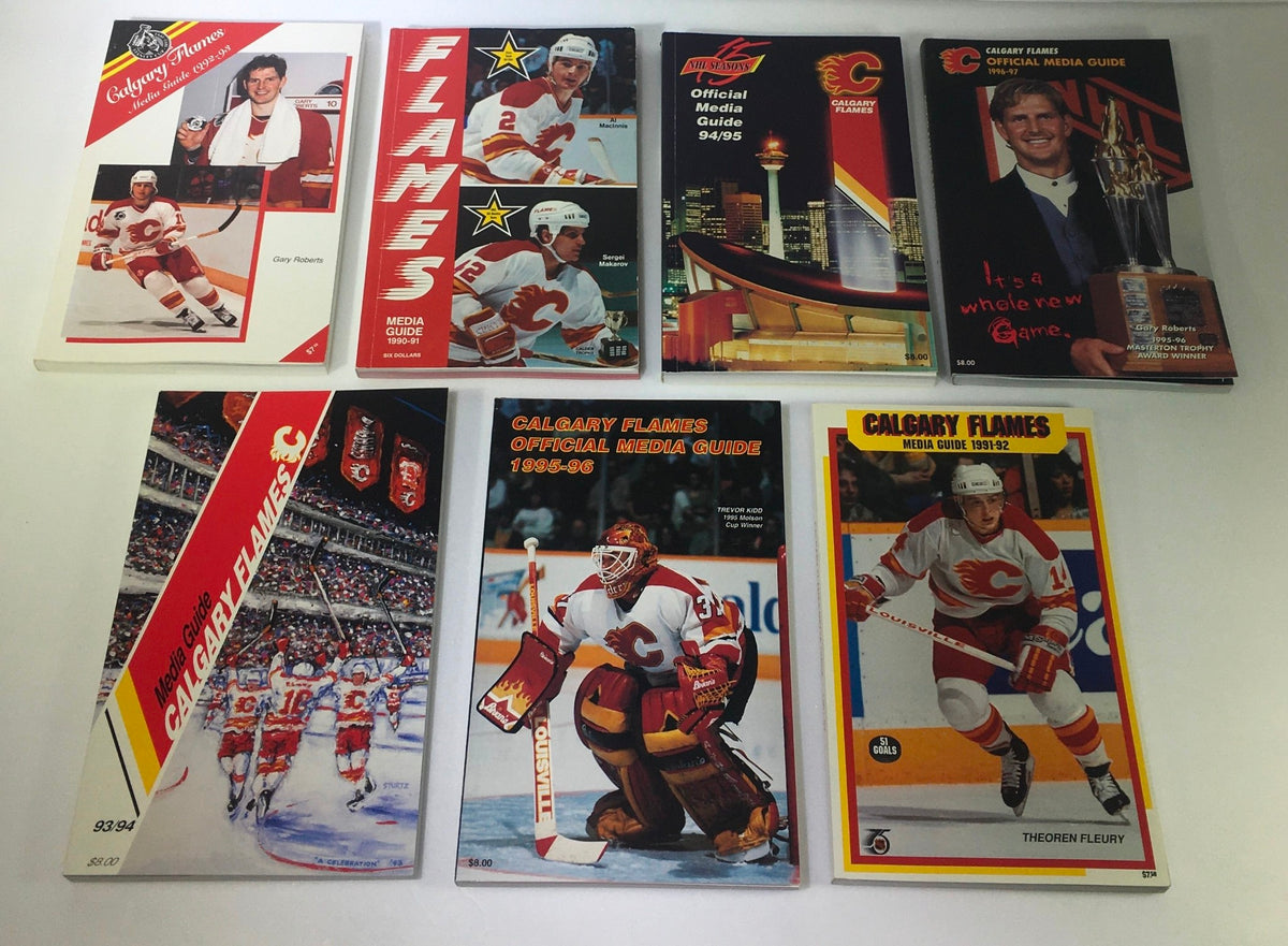 Lot of 7 VTG NHL Official Calgary Flames Media Guide 1990 - 1997 featuring covers from various seasons, showcasing iconic players and memorabilia.