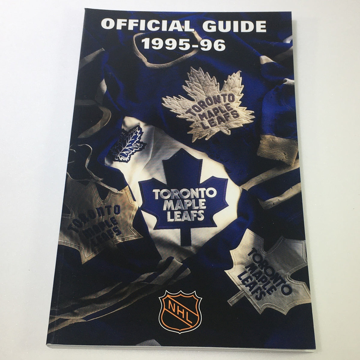 1995-96 Toronto Maple Leafs Official Guide displaying the team's logo and jerseys, part of the Lot of 8 VTG NHL Official Toronto Maple Leafs Official Guide Yearbook 1987-1997 collection.