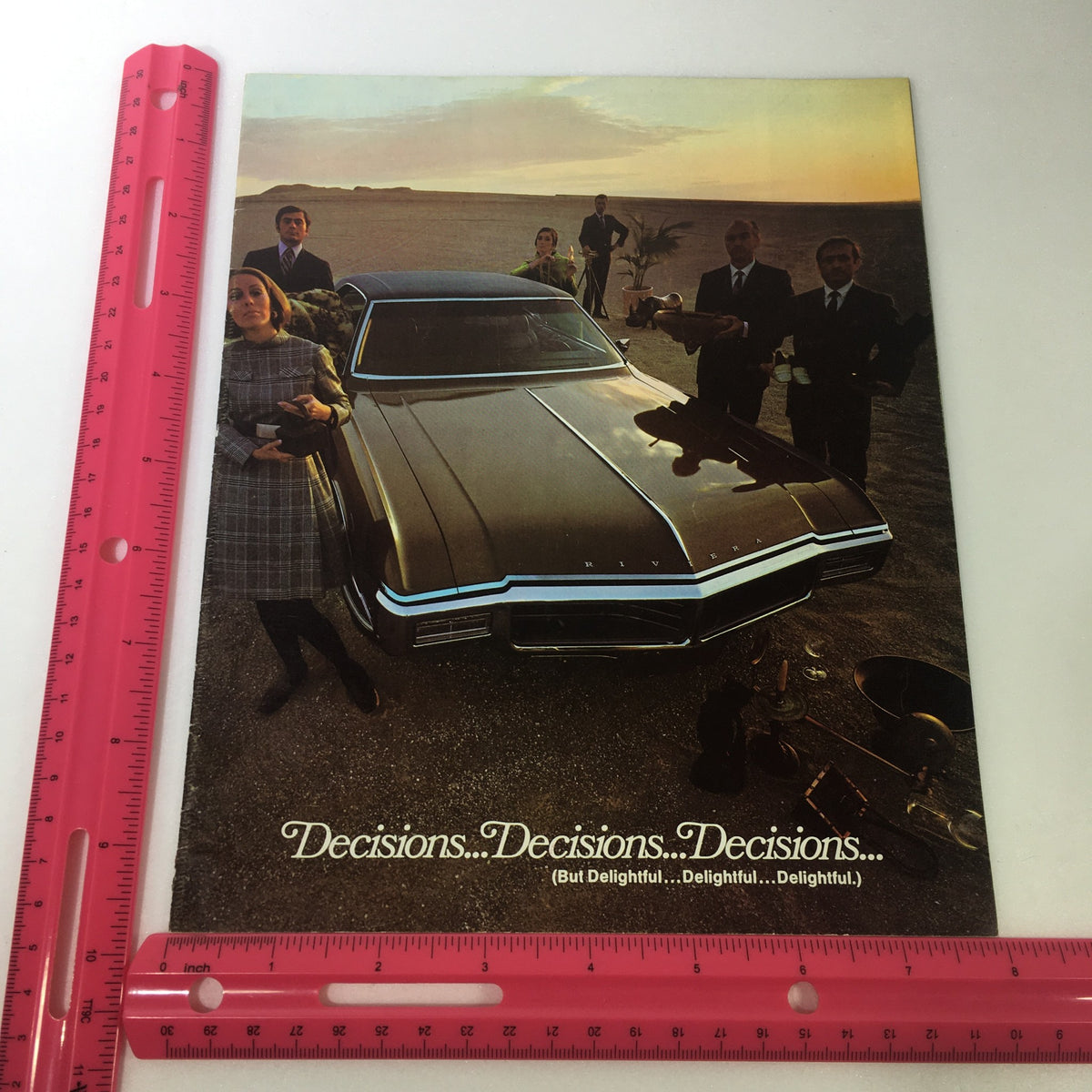 VTG 1969 Buick Motor Division Electra 225 Car Auto Brochure Catalog highlighting a Buick with elegantly dressed individuals, emphasizing luxury.