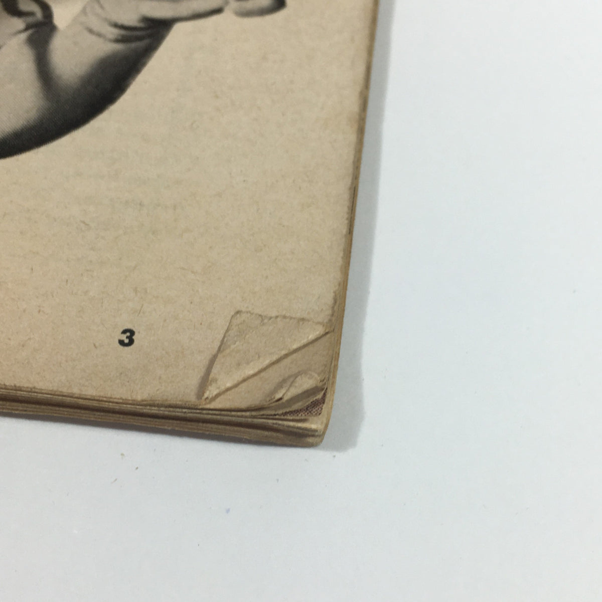 Detail of the corner of VTG 'Teen Magazine May 1961 showing minor wear and page number 3.