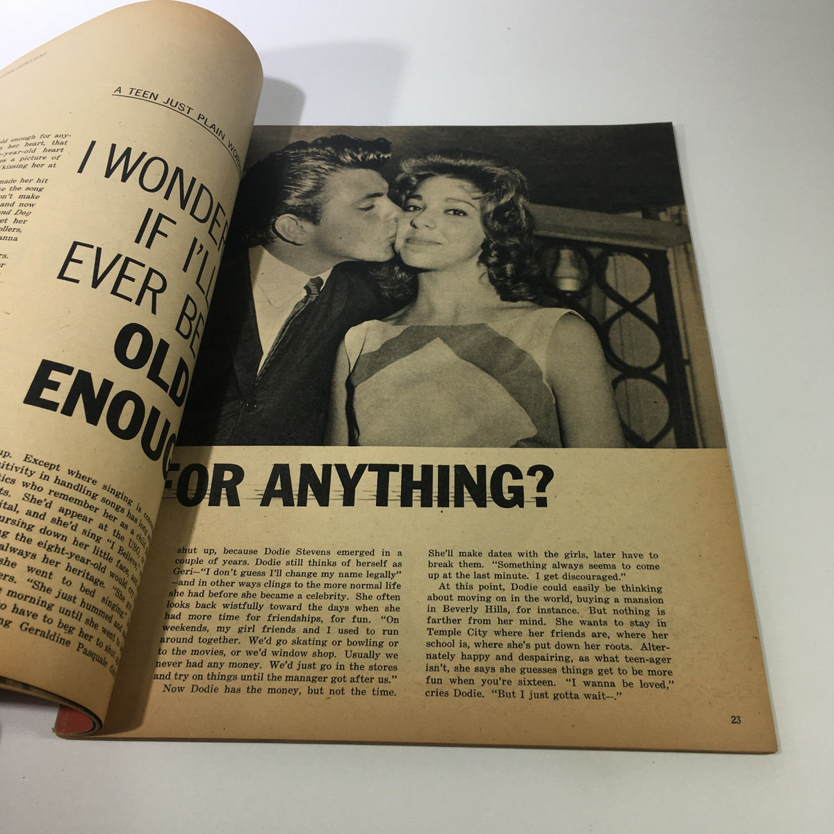 Interior page of VTG Hollywood Teen-Agers Magazine No. 1 1960 showcasing a romantic moment, highlighting teen relationships and youth culture.