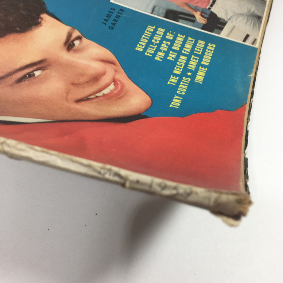 Close-up view of the spine and edge of the VTG Movie Land & TV Time Magazine from May 1959 featuring Frankie Avalon and Debbie Reynolds, showcasing minor wear and vintage charm.