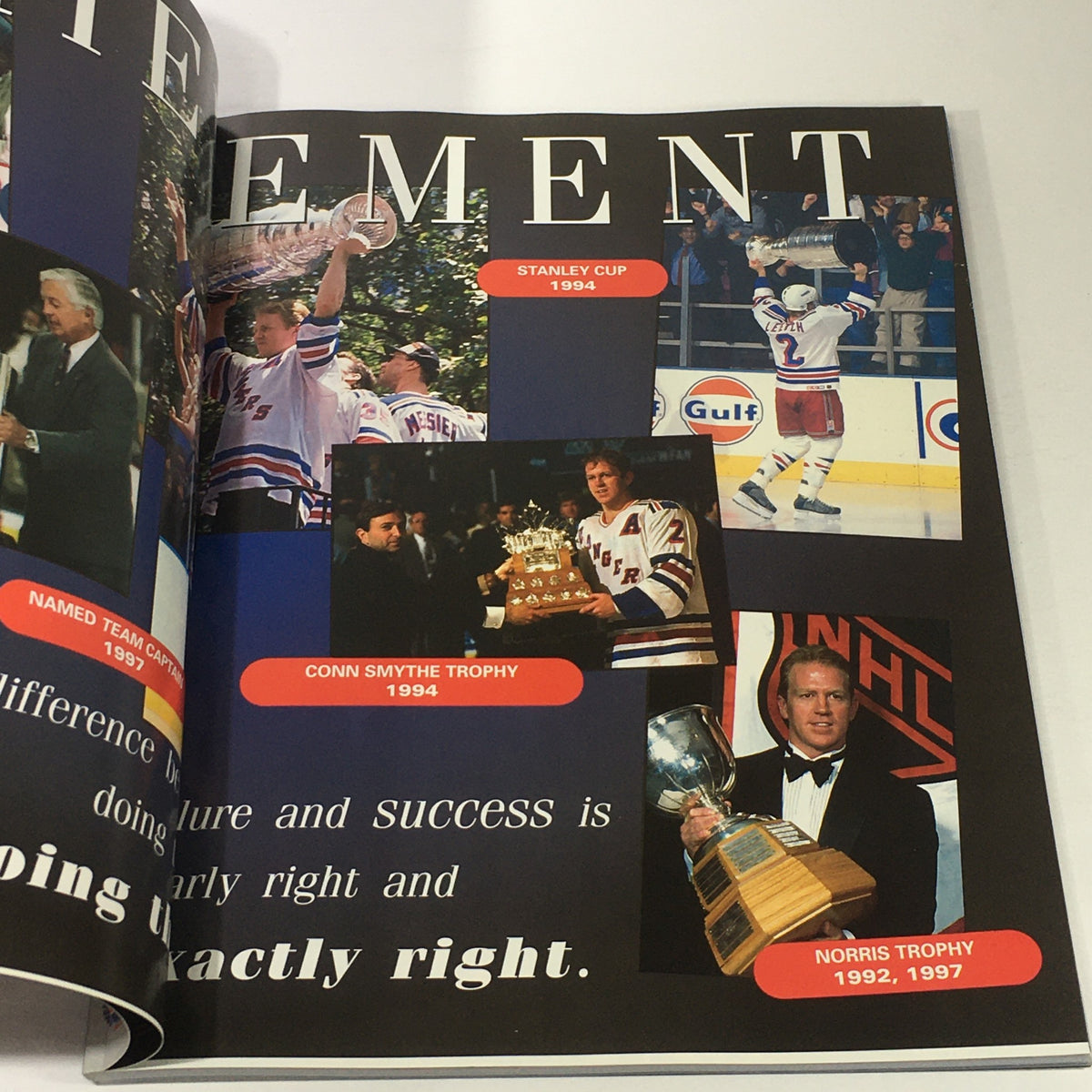 Interior page of VTG NHL Official Yearbook 1998-1999 featuring images of players with Stanley Cup and awards like Conn Smythe Trophy and Norris Trophy.