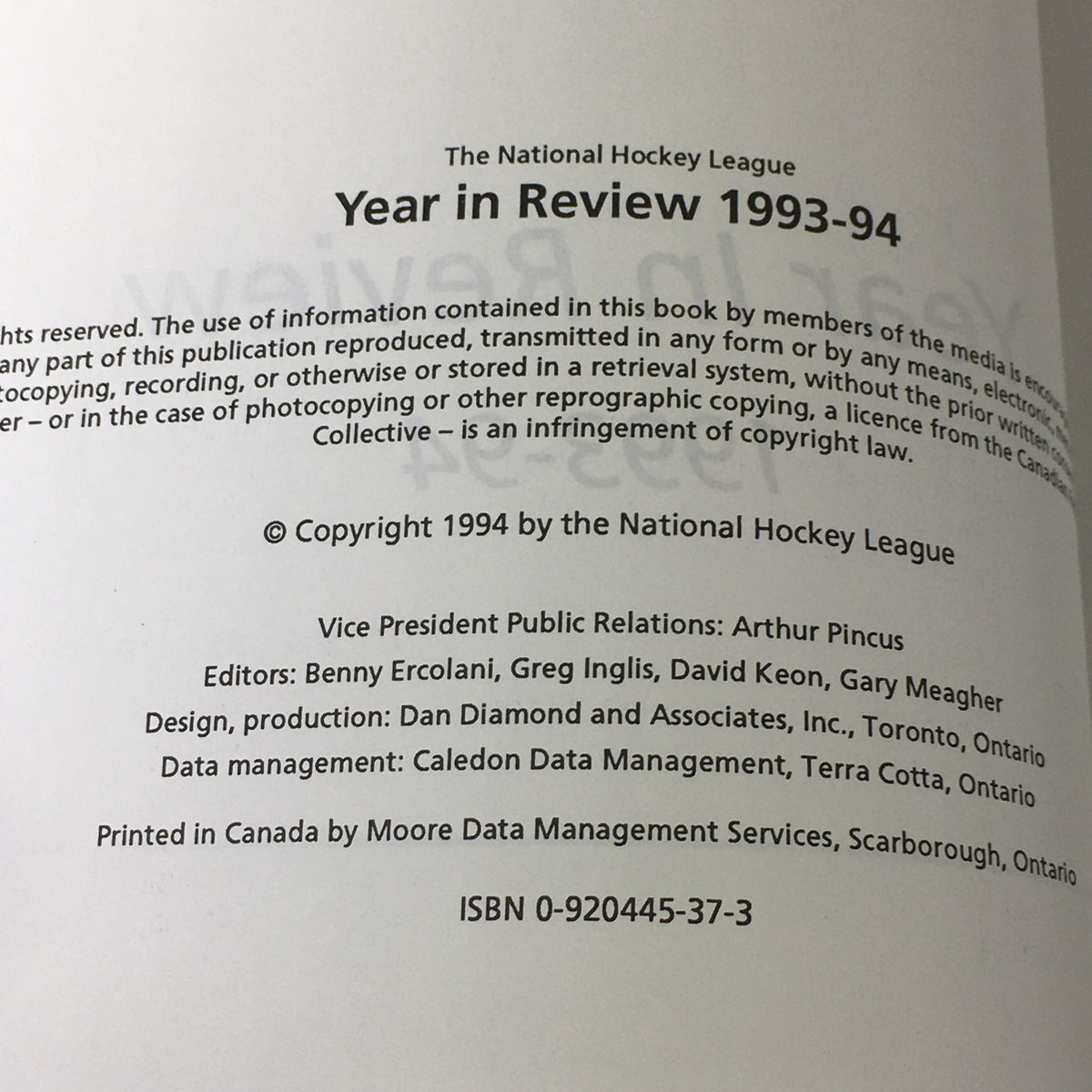 Inside page of the VTG NHL Official Year In Review 1993-1994 Minor Professional Hockey book, featuring copyright information and editing details.