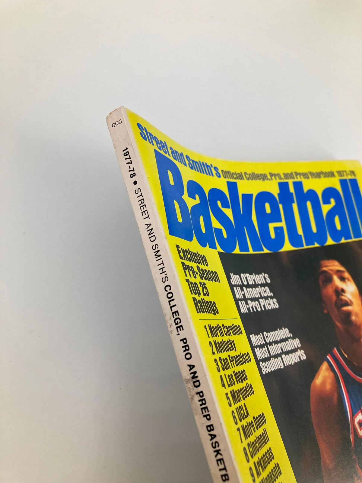Side view of the VTG Street & Smith's Official Yearbook Basketball 1977, showcasing the spine and details of the vintage magazine, ideal for collectors and enthusiasts.