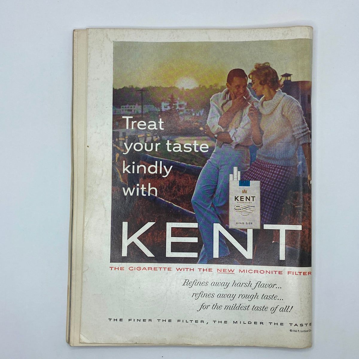 Advertisement from VTG Playboy Magazine October 1962 showcasing KENT cigarettes with a couple enjoying a sunset.