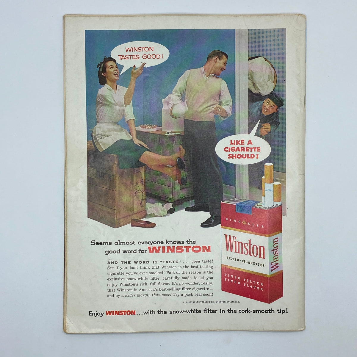 Vintage Playboy Magazine May 1957 featuring Playmate Dawn Richard, showcasing a colorful cigarette advertisement for Winston with a woman and two men engaged in playful conversation.
