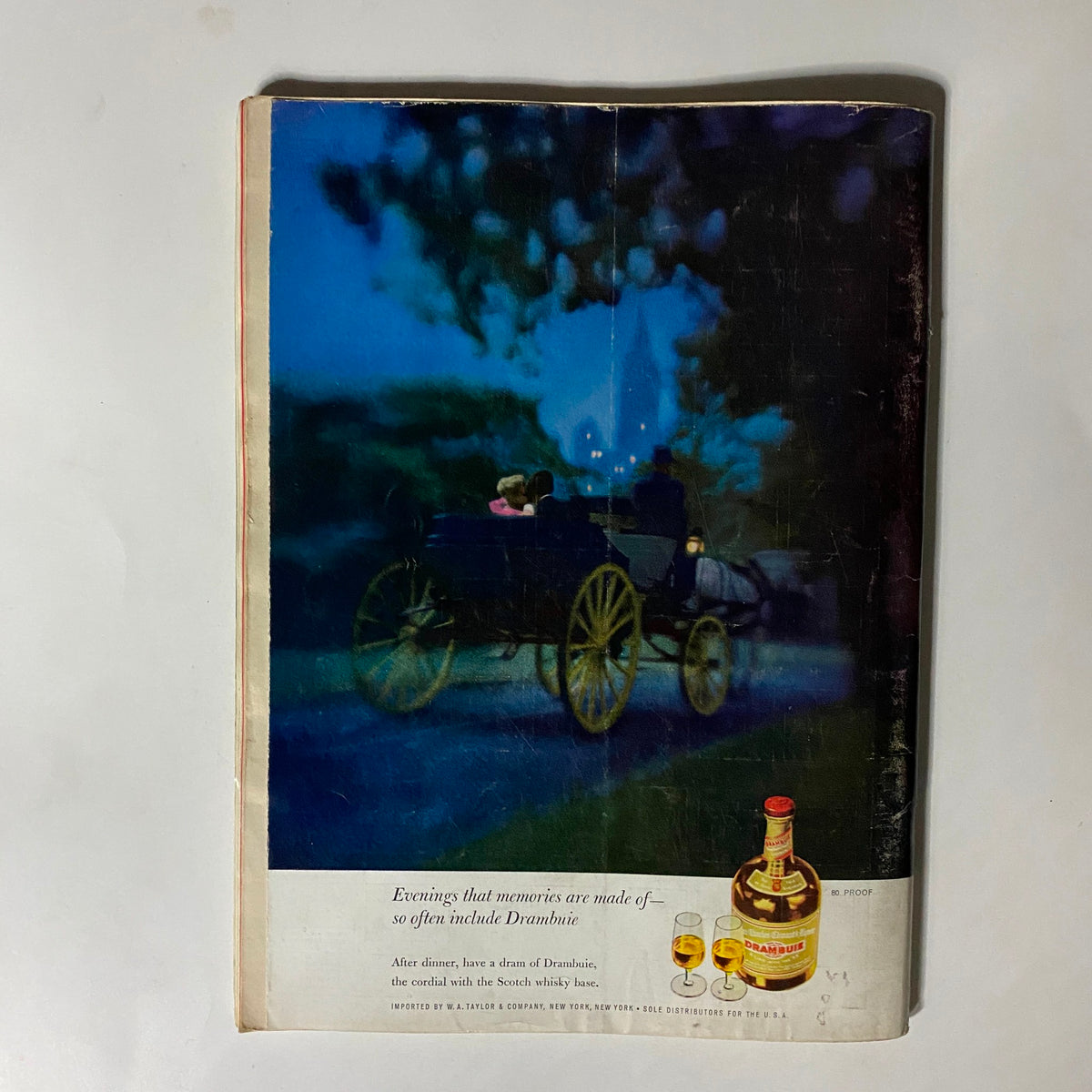 VTG Playboy Magazine December 1961 Cover with Lynn Karrol featuring an artistic representation of a horse-drawn carriage at night, highlighting the nostalgic theme associated with the publication.