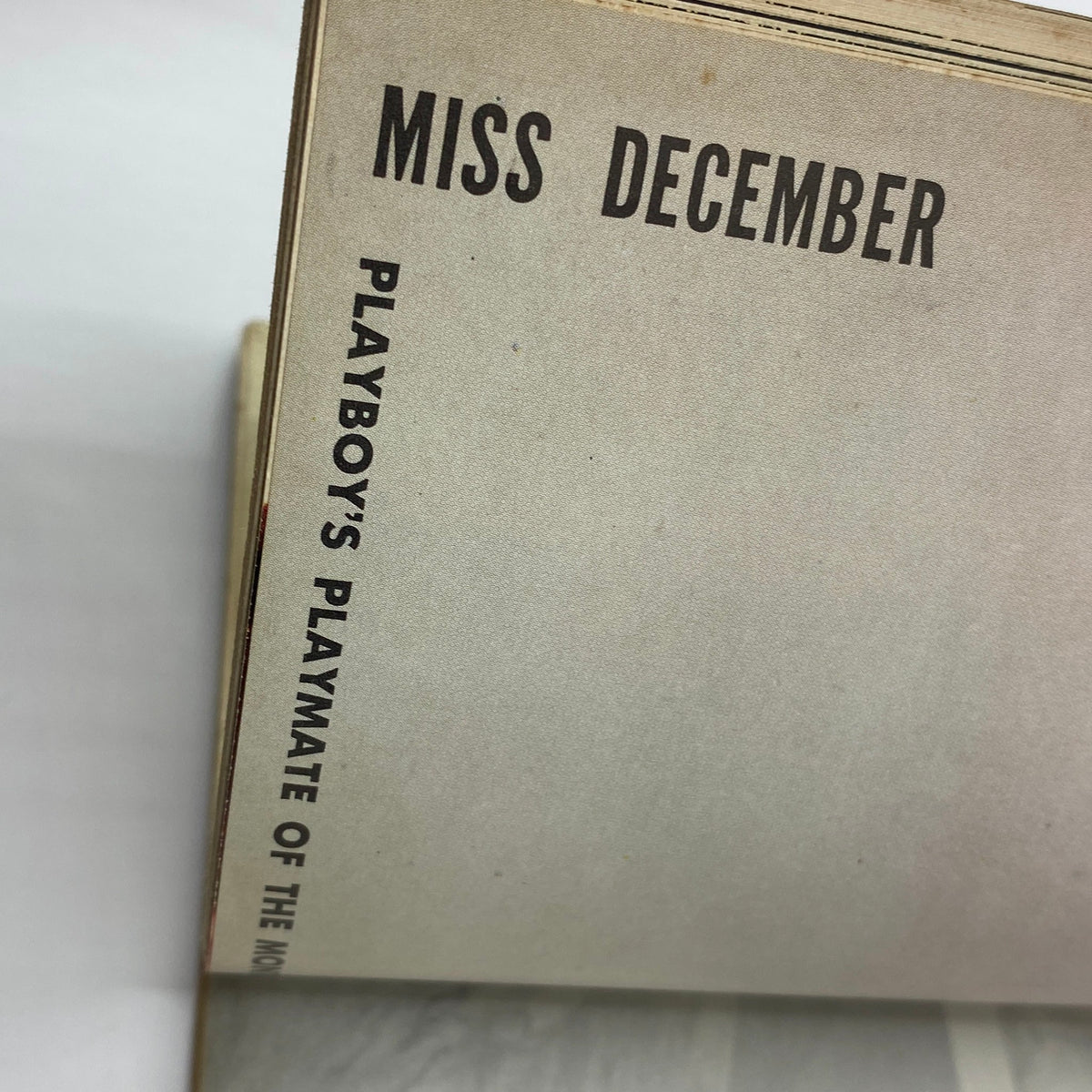 Page labeled 'MISS DECEMBER' from VTG Playboy Magazine December 1960, featuring the title of the Playmate of the Month section.
