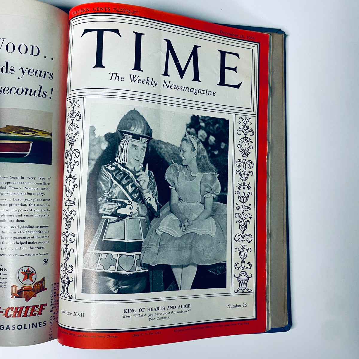 Cover of Time Magazine featuring King of Hearts and Alice from December 25, 1933. This image is featured in the library bound collection detailing events from October 2 to December 25, 1933.
