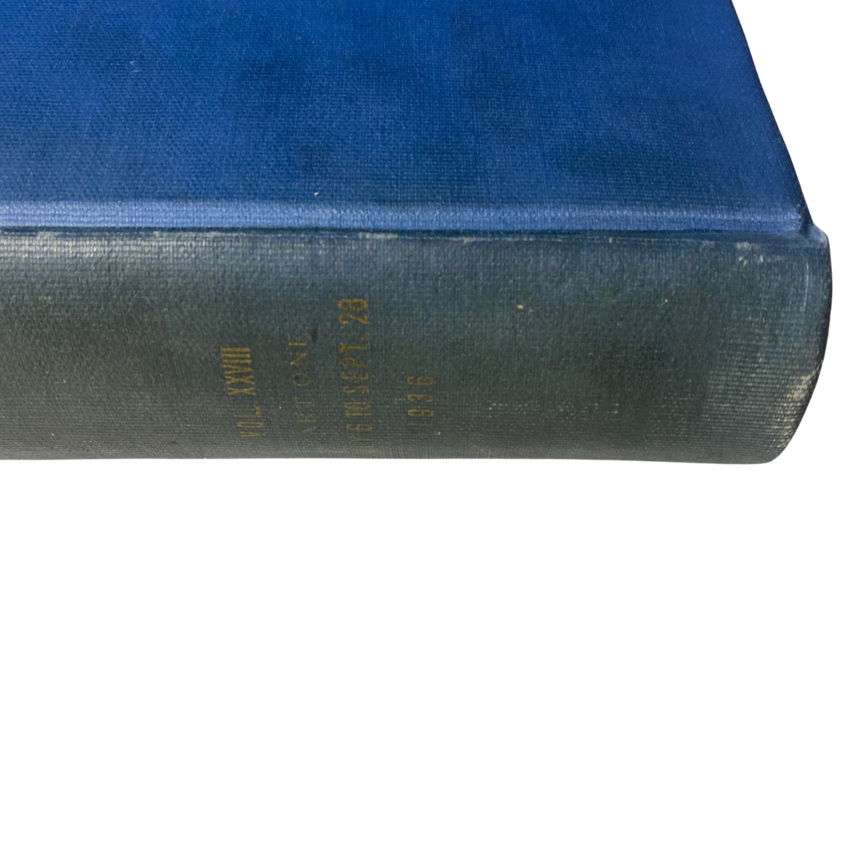 Close-up of the spine of the Time Magazine Library Bound July 6-September 28, 1936, featuring embossed text detailing the volume number and year.