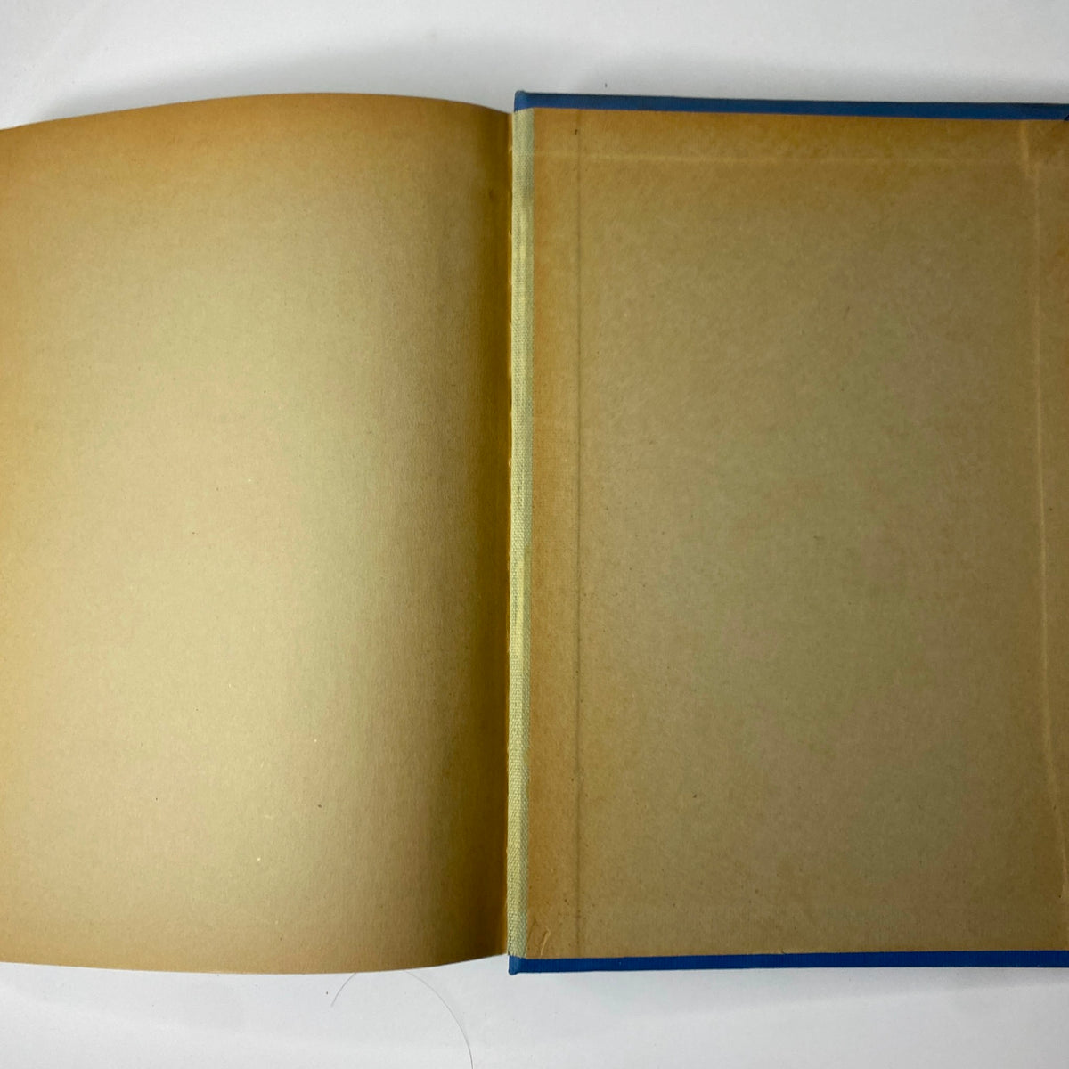 Blank inner pages of the Time Magazine Library Bound July 6 - September 28, 1936, showcasing the unprinted section of the book, reflecting typical age-related wear.