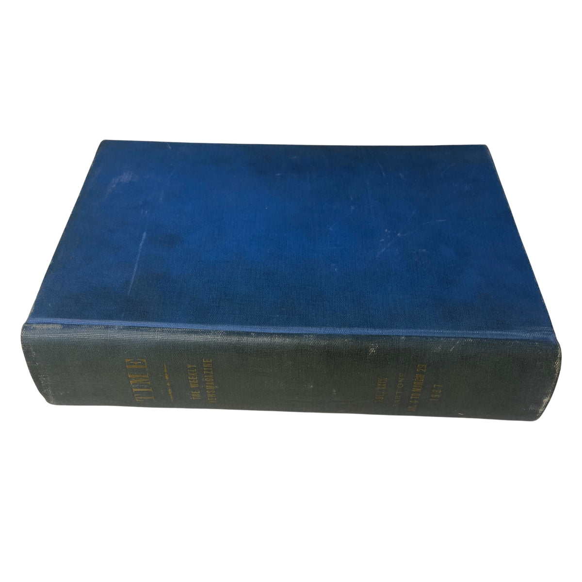 Top view of a library-bound edition of Time Magazine from 1937, featuring blue fabric cover, preserving issues from January 4 to March 29.