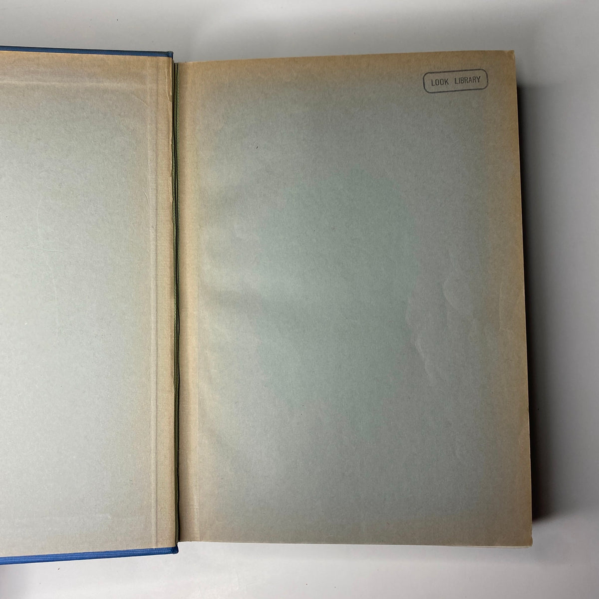 Inside view of the Time Magazine Albert Einstein 1938 bound volume revealing the library label on the inner cover, showing its archival status.
