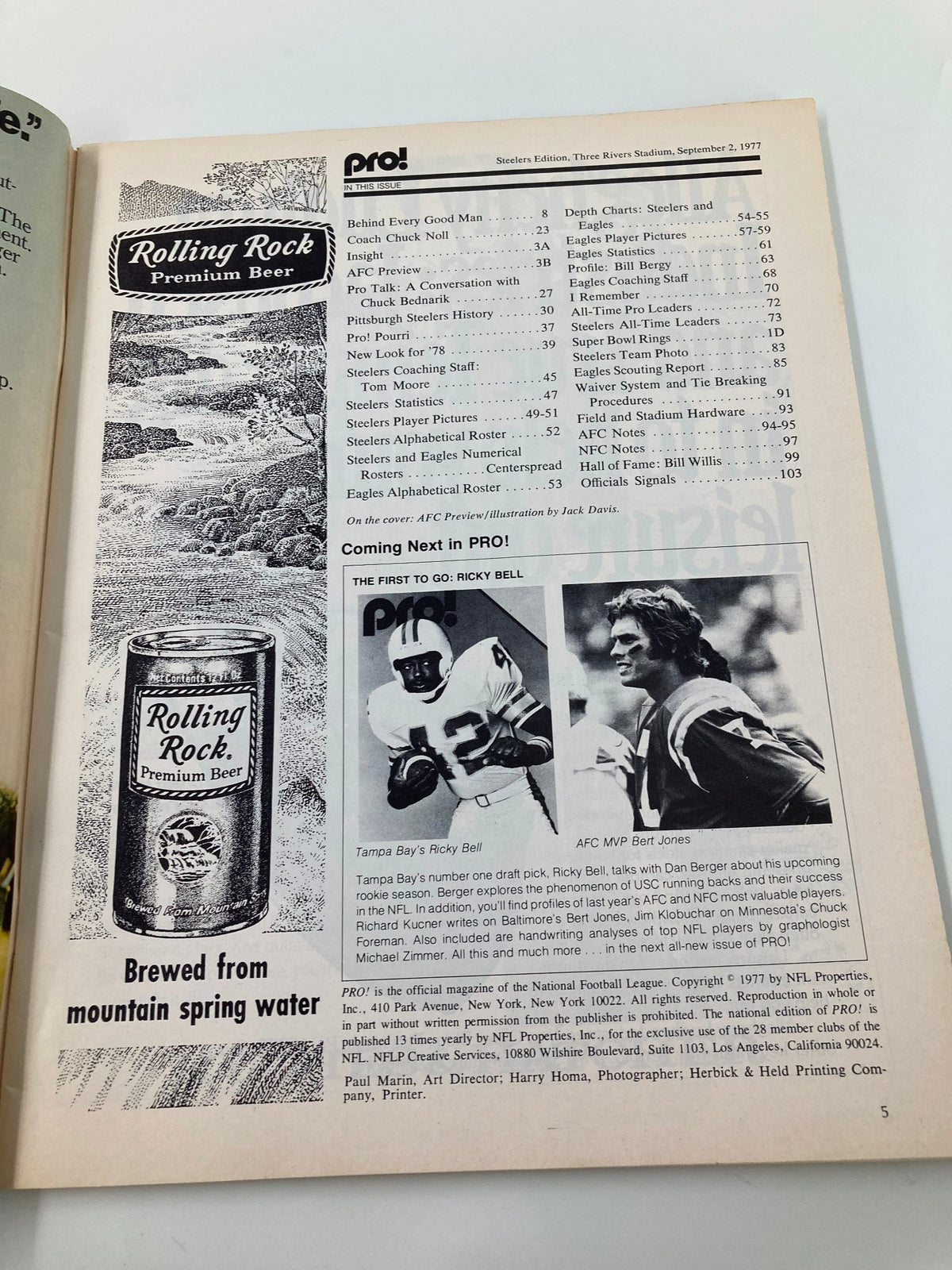 Inside page of the VTG Pro! Official NFL Magazine September 2 1977 featuring an advertisement for Rolling Rock Premium Beer, along with the contents page listing articles on NFL players Ricky Bell and Bert Jones.