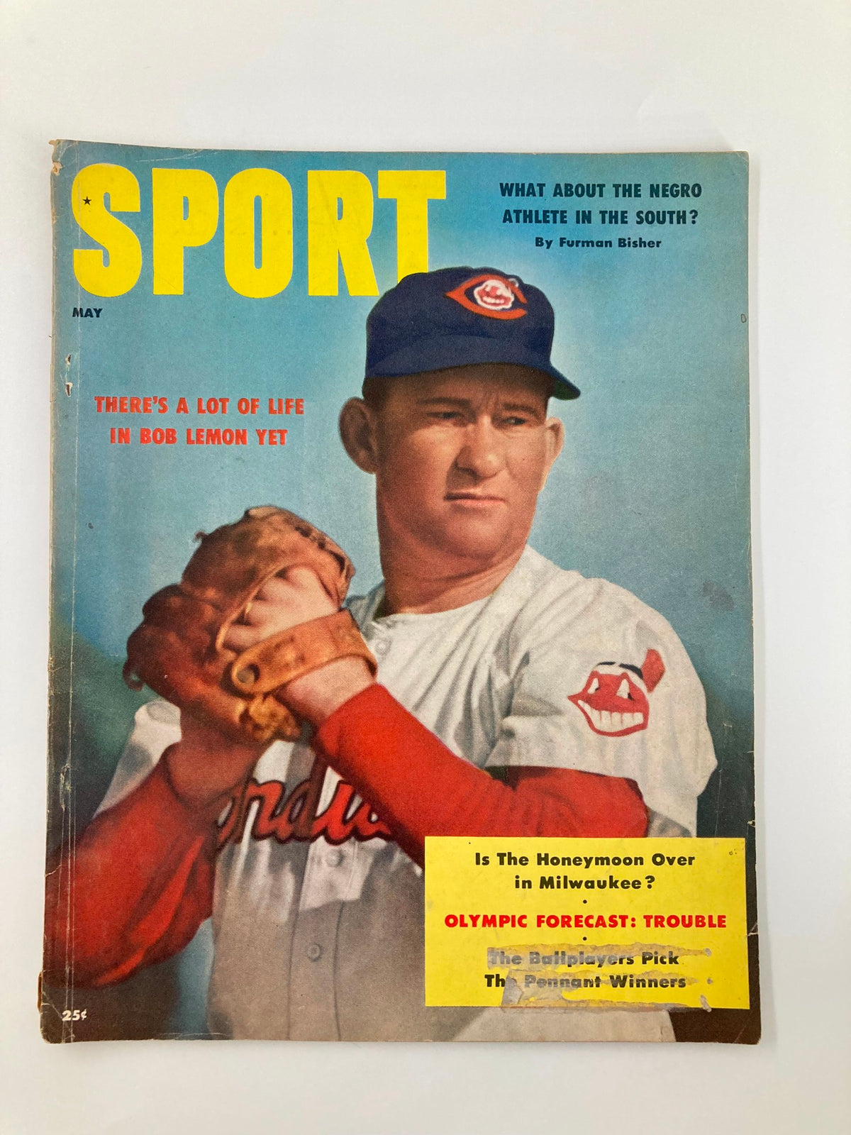 Cover of VTG Sport Magazine May 1956 featuring Bob Lemon, iconic baseball player, with the headline 'There's A Lot of Life in Bob Lemon Yet'. The magazine displays vibrant colors and captivating imagery related to 1950s sports.