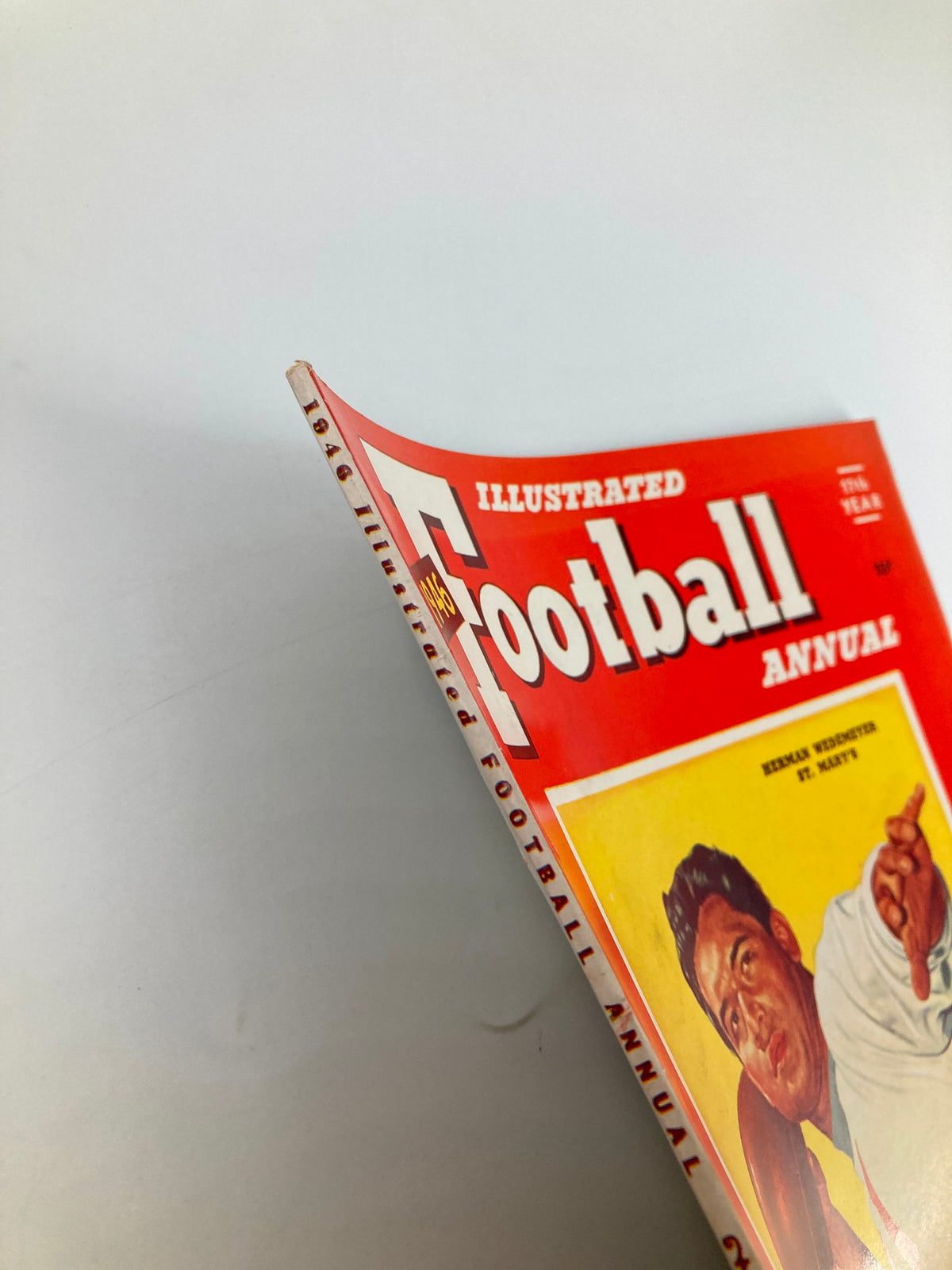 Side view of the VTG Illustrated Football Annual 1946, highlighting the vintage design and condition of the magazine.