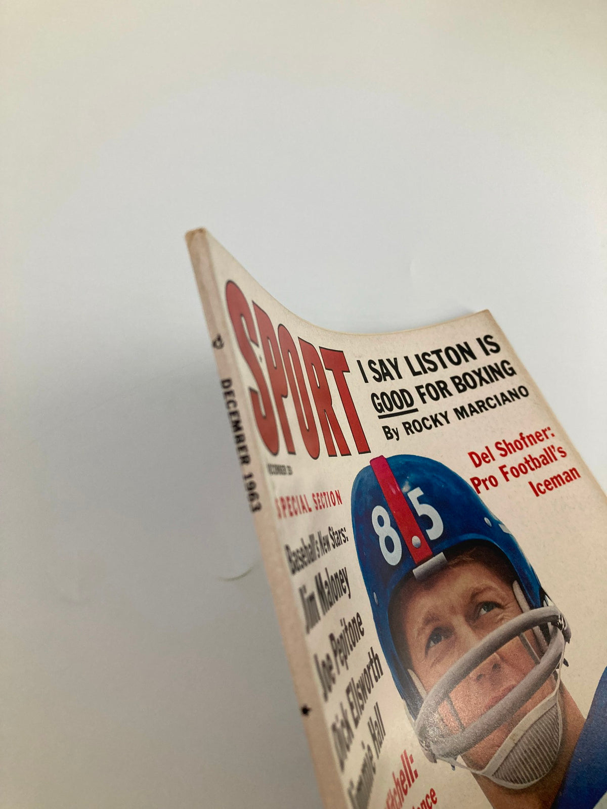 Side view of the VTG Sport Magazine December 1963 cover showcasing Del Shofner, reflecting the vintage appeal of classic sports publications.