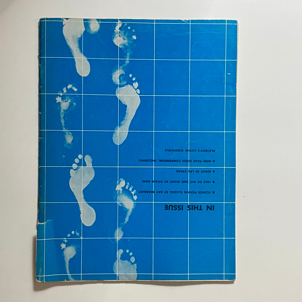 Playboy Magazine June 1956 featuring Gloria Walker cover with blue background and footprints design, perfect for collectors of vintage magazines.