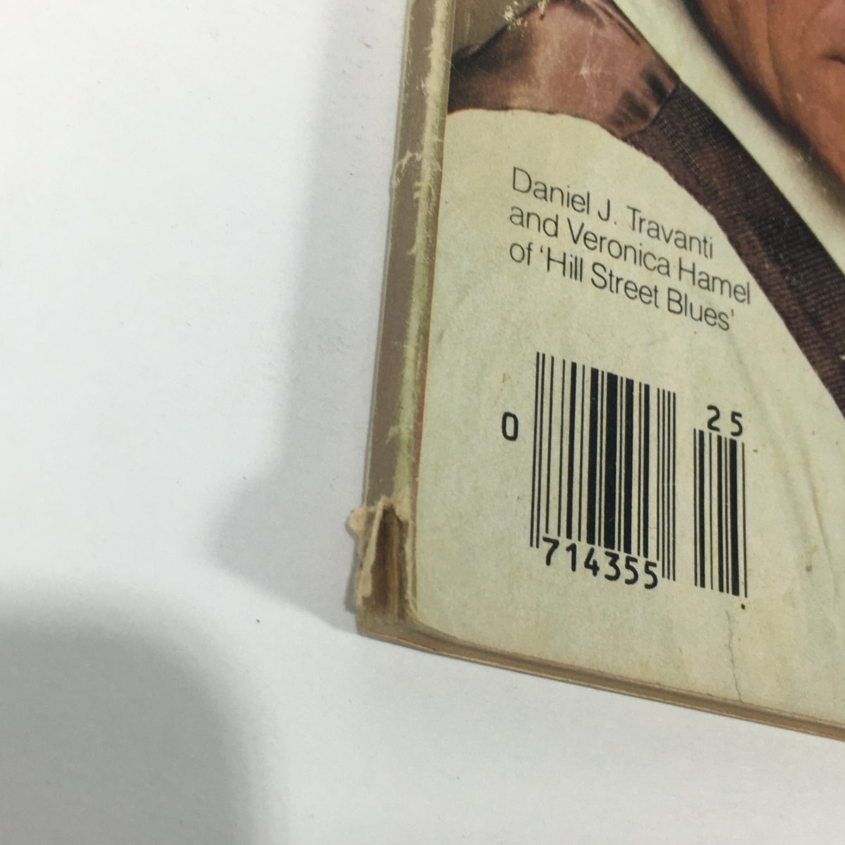 Back cover of the Vintage TV Guide Magazine from June 19-25, 1982, displaying the barcode and text featuring Daniel J. Travanti and Veronica Hamel, stars of 'Hill Street Blues'.