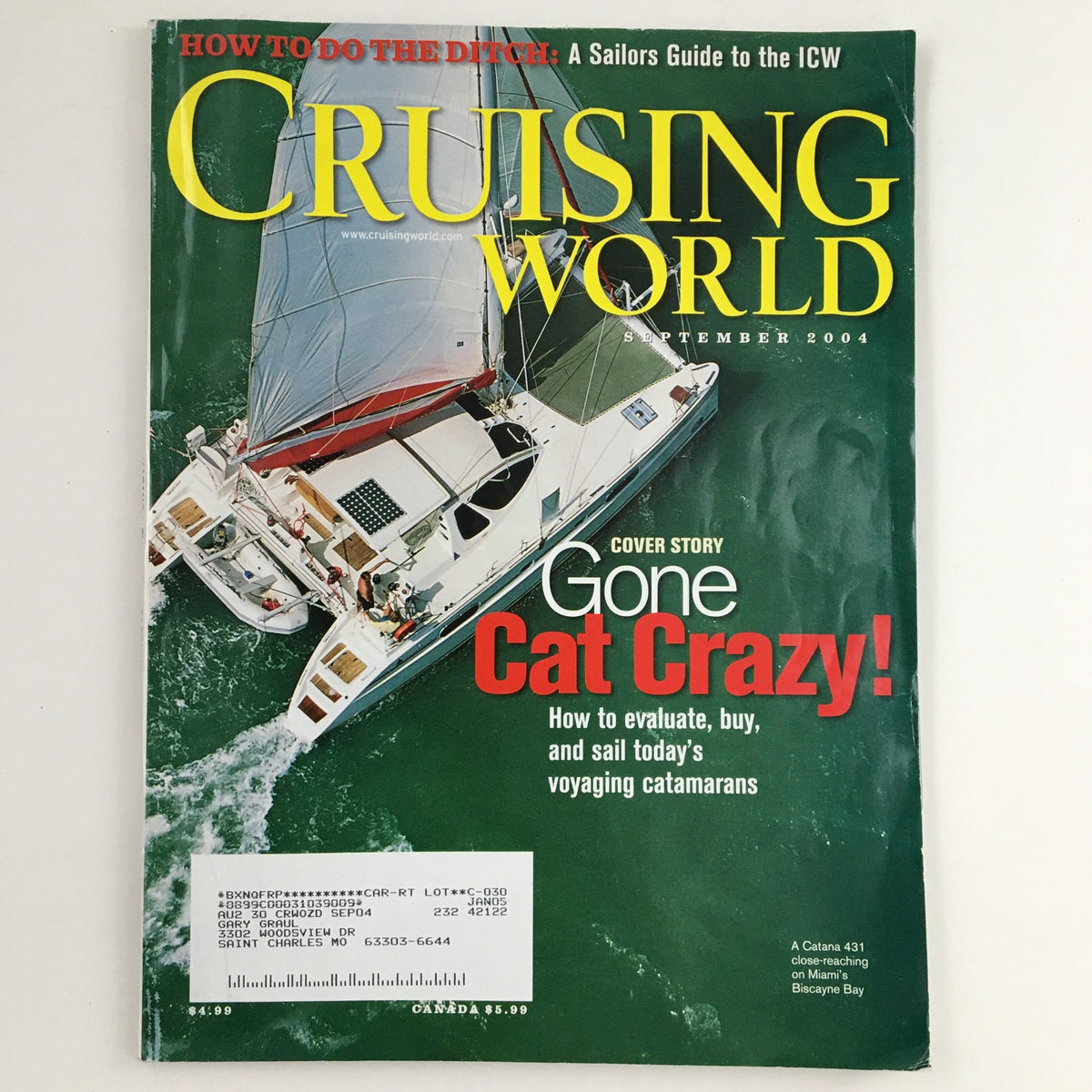 Cruising World Magazine September 2004 cover featuring the Catana 431 catamaran on Miami's Biscayne Bay, highlighting the cover story 'Gone Cat Crazy'.